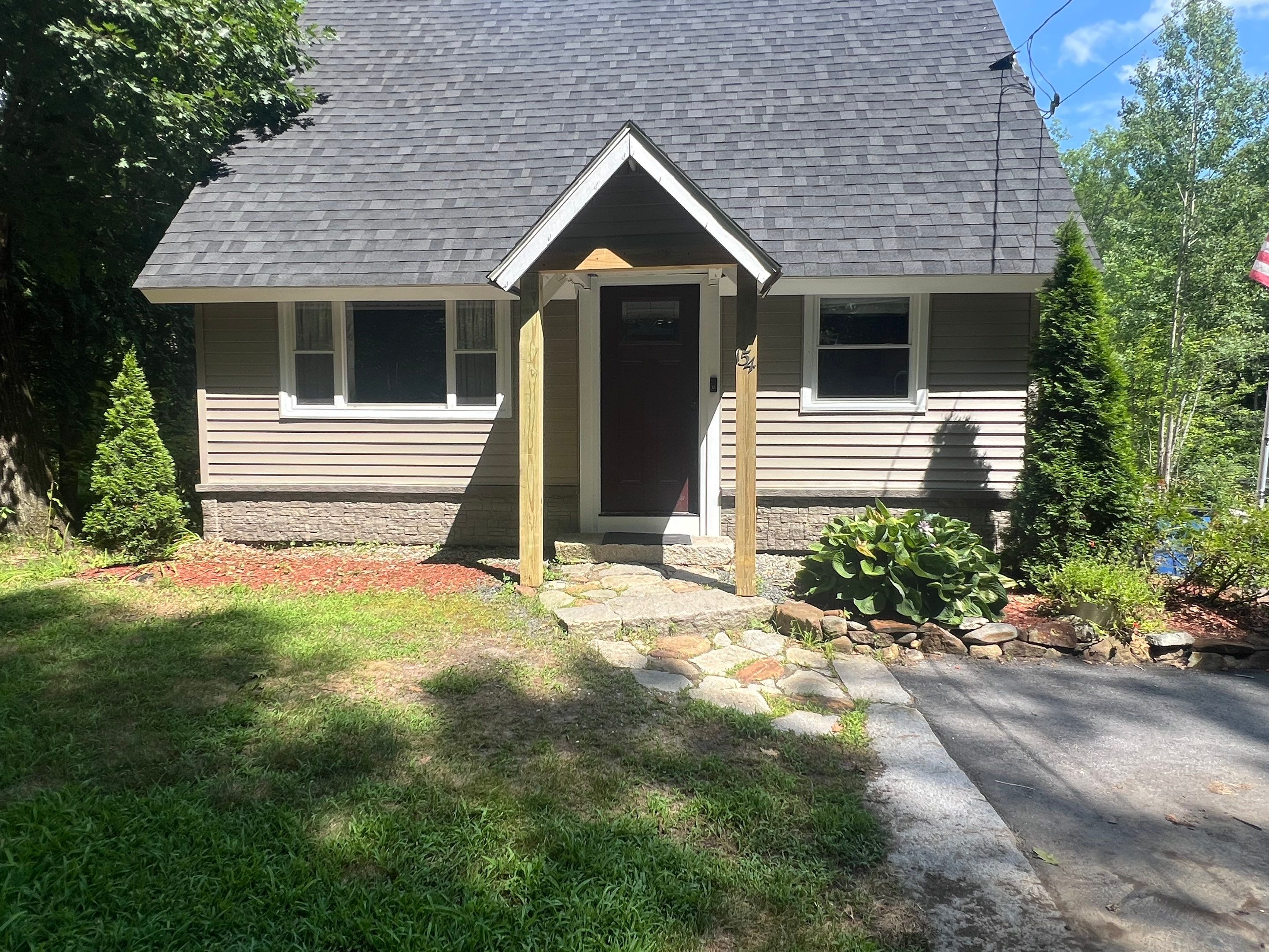 Weare, NH – TandoStone® Stone Facade Installation by Tall pine roofing