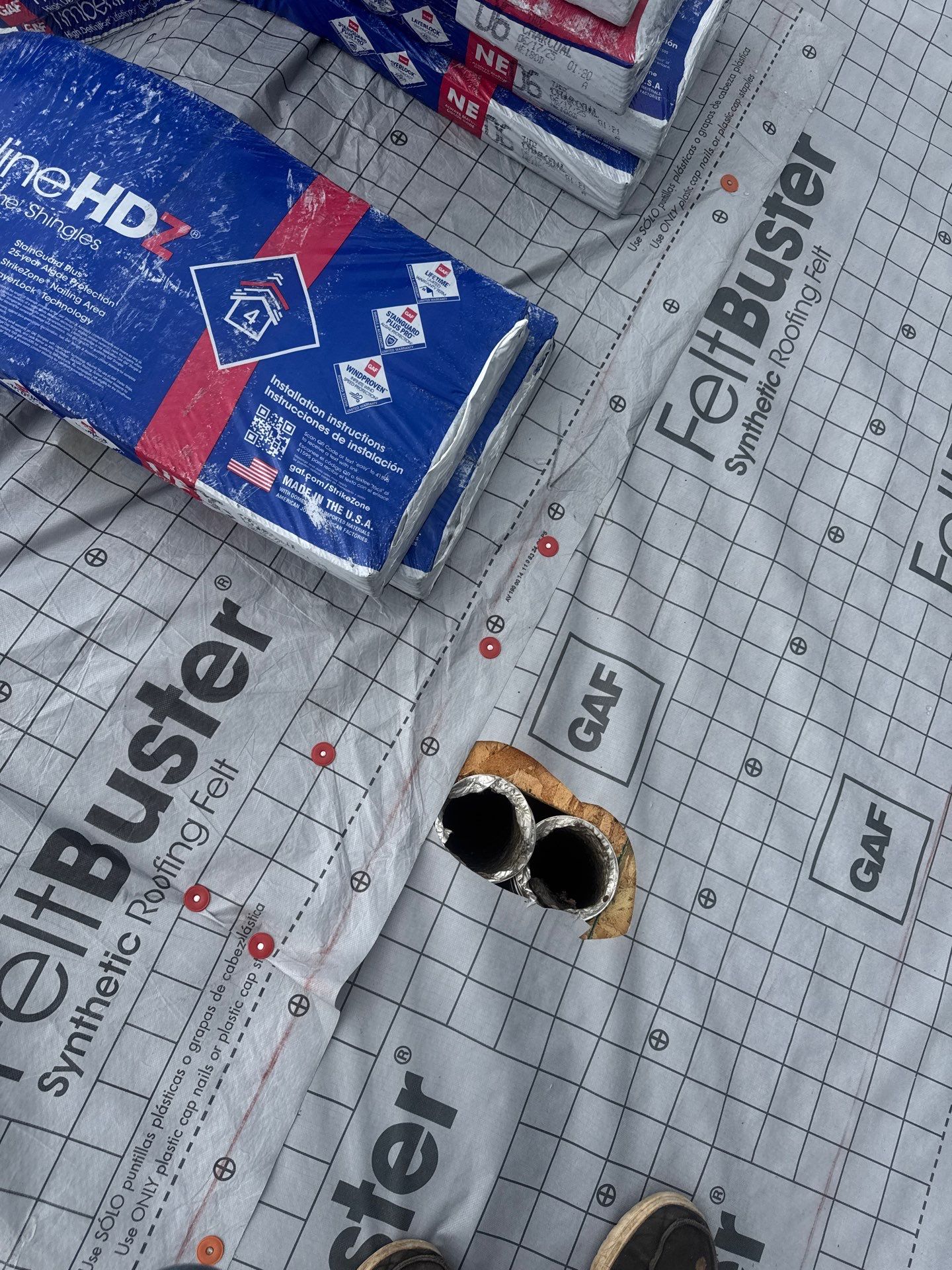 Commercial Roofing Installation using GAF Timberline HDZ Charcoal by Rainstoppers Roofing