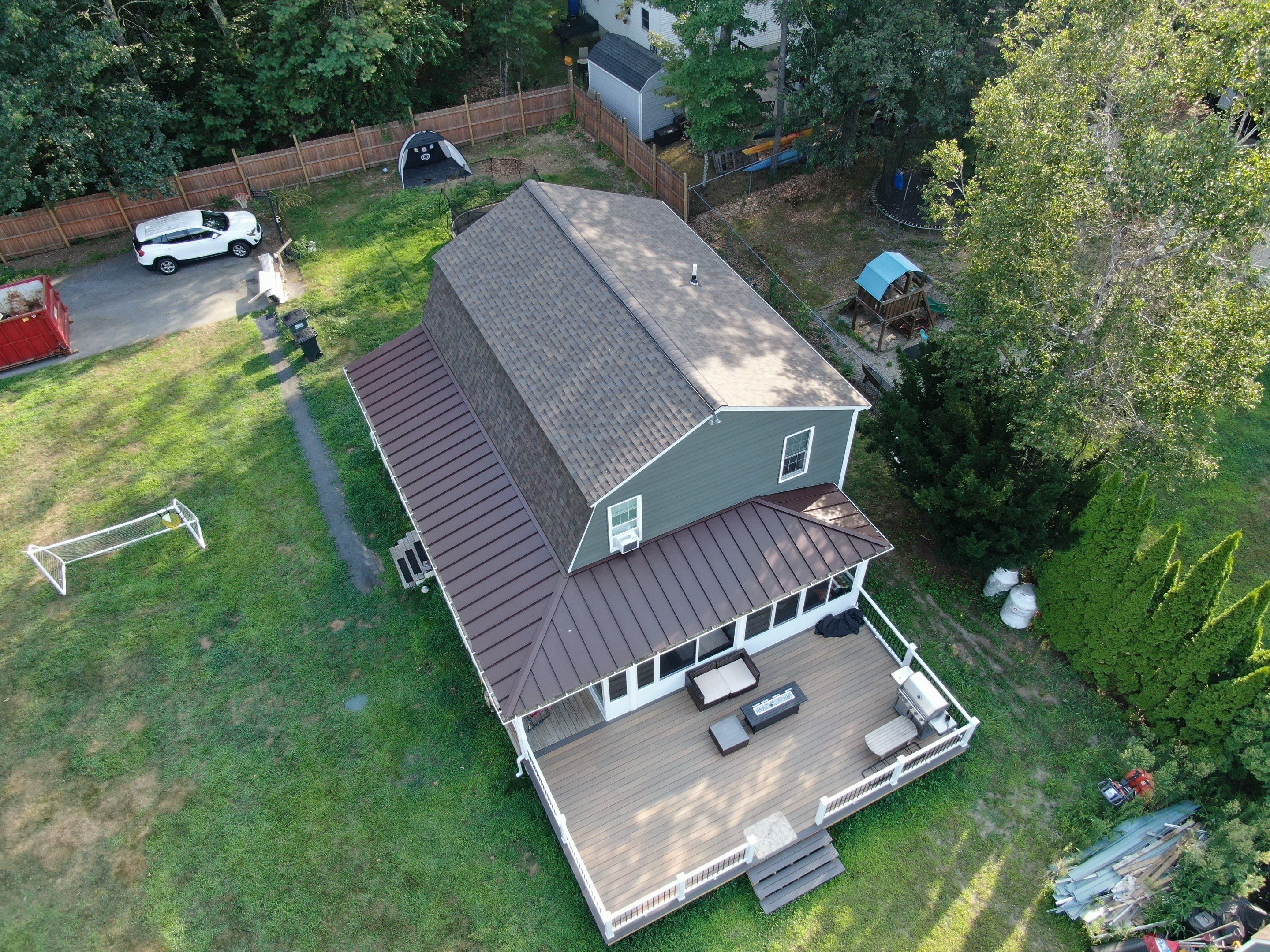 Full Roof Replacement & Farmers Porch Restoration – Asphalt + Standing Seam Metal by Mighty Dog Roofing of Greater Middlesex County