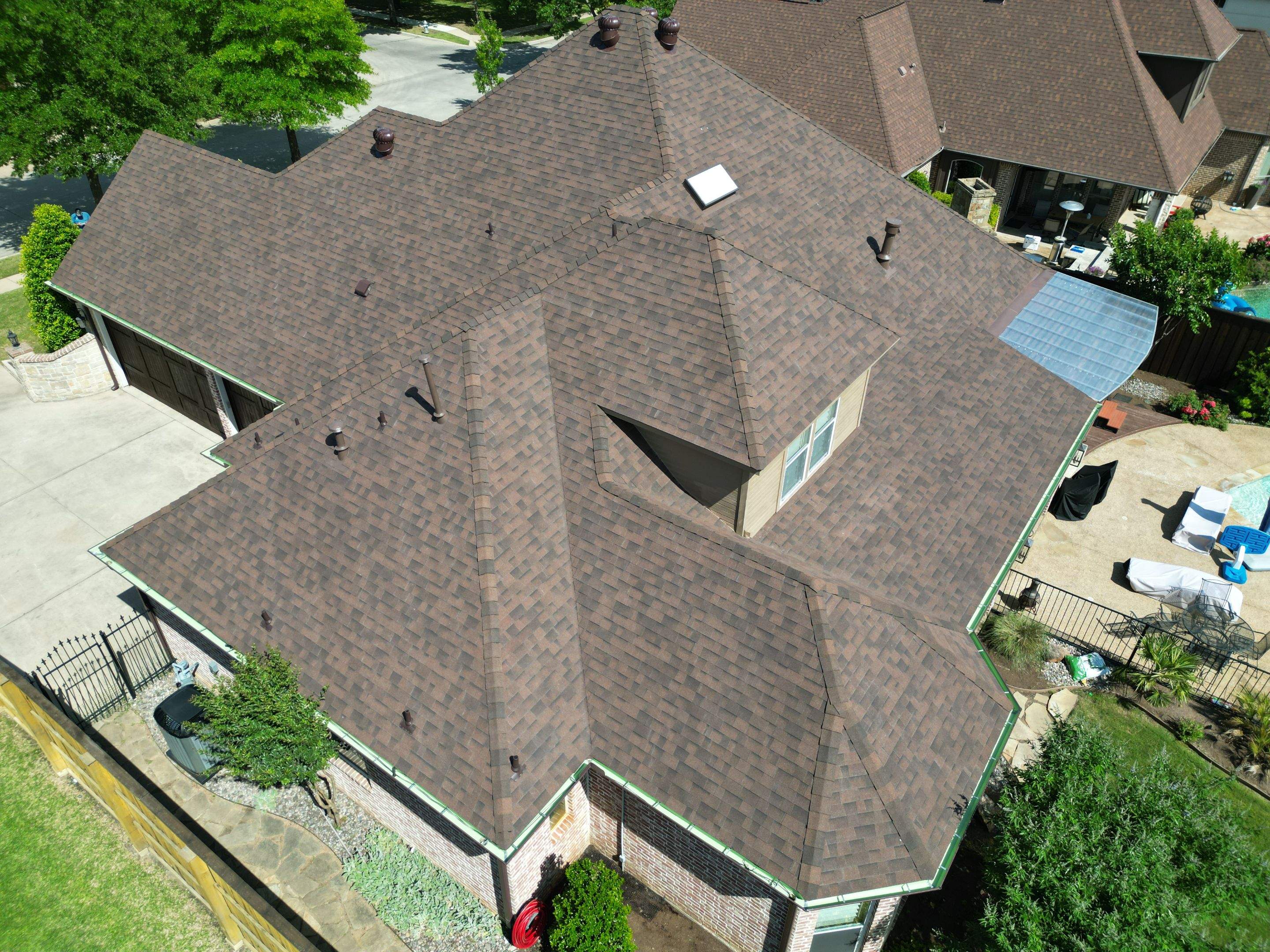 Residential Roofing Installation using Malarkey Legacy Scotchgard Shingles by Harvey Roofing & Construction