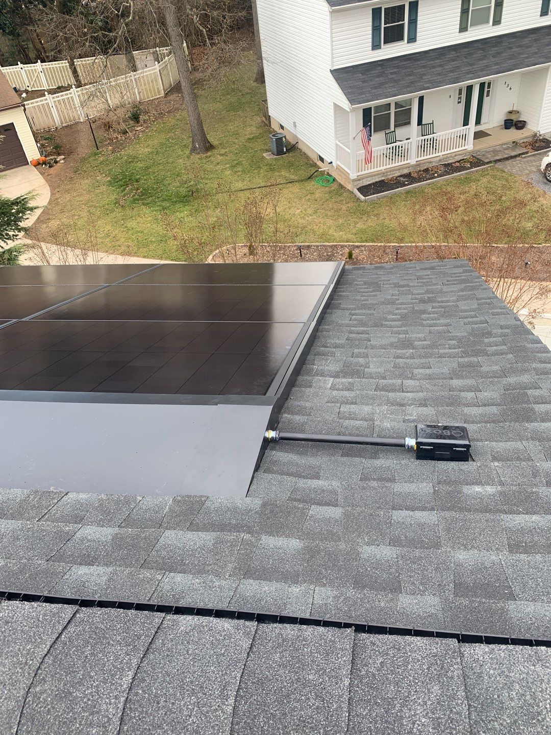 Roof Replacement with GAF Decotech integrated solar panels by American Home Contractors
