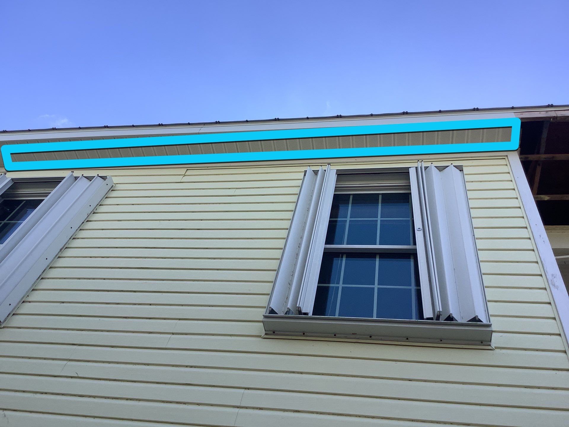 White Gutters with Matching Downspouts in Sarasota FL by Gutter Professors