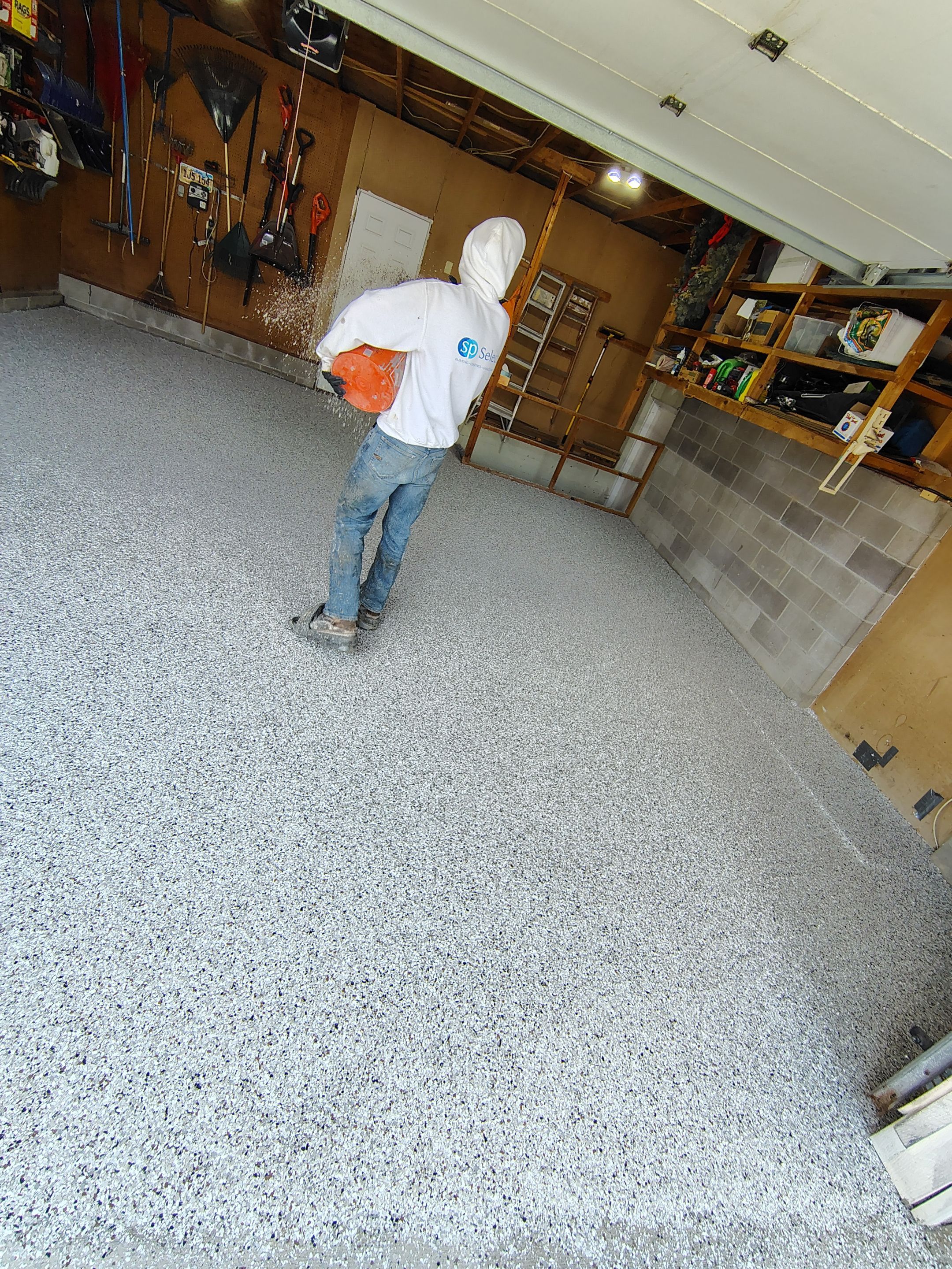 Sioux Falls Garage Epoxy Floor Installation and Concrete Crack Repair by Select Painting, Coatings & Garage Cabinets