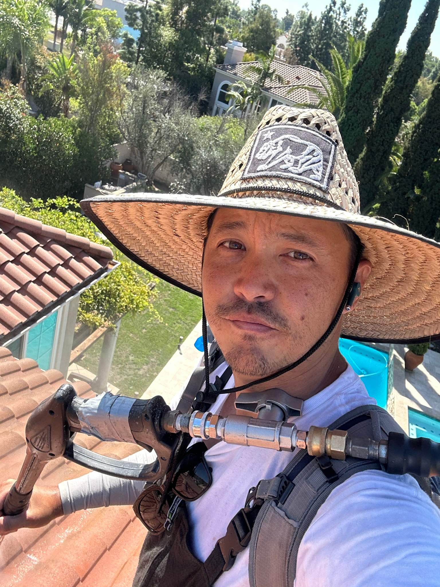 Roof wash on this dirty roof covered in algae by Property Cleaning Experts