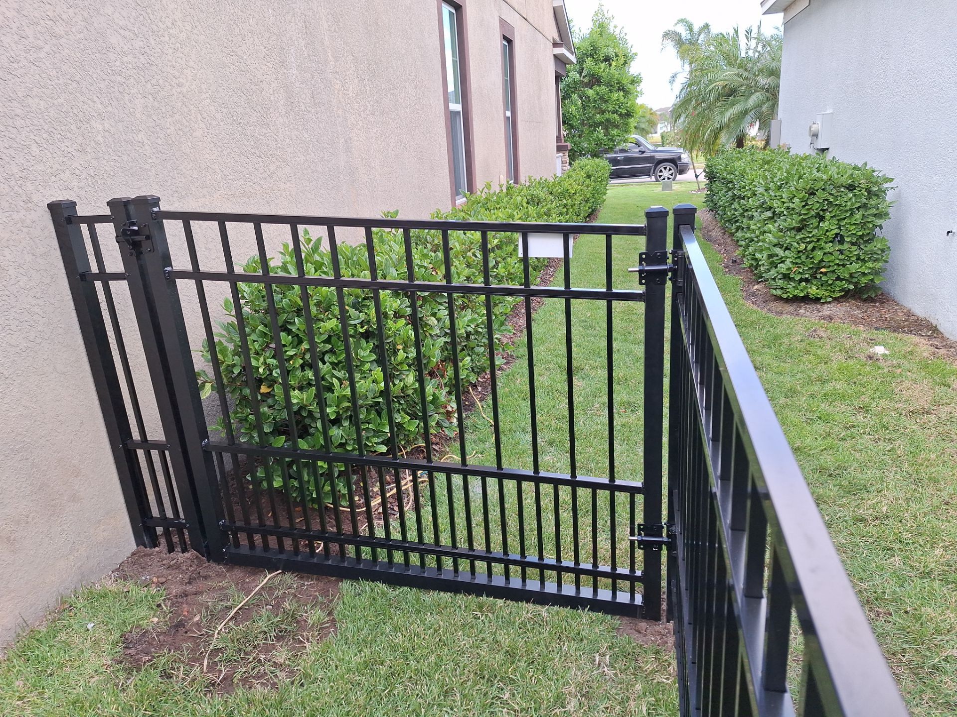 Aluminum Fence Installation using Puppy Picket by Asap fence and gates, LLC