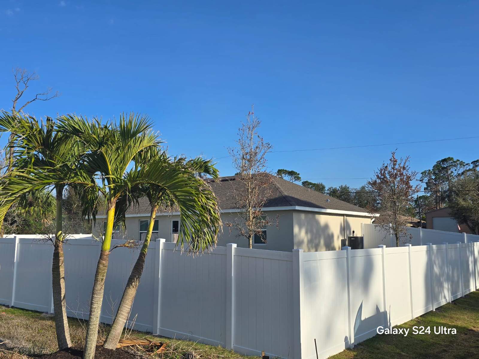 Residential White Vinyl Privacy Fence Installation in North Port by True Fence LLC