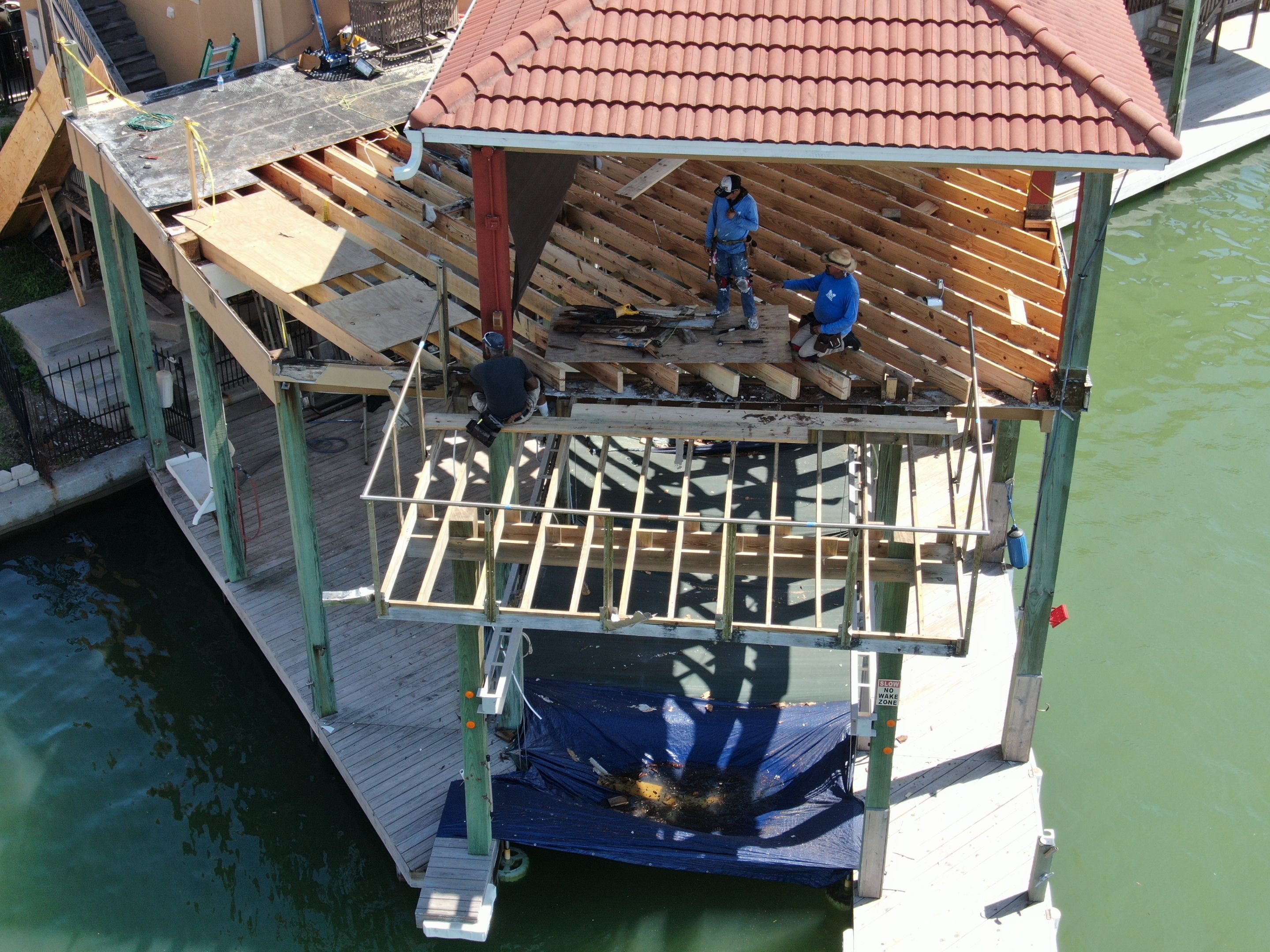 Walk Out Patio Cover by Bayfront Roofing and Construction