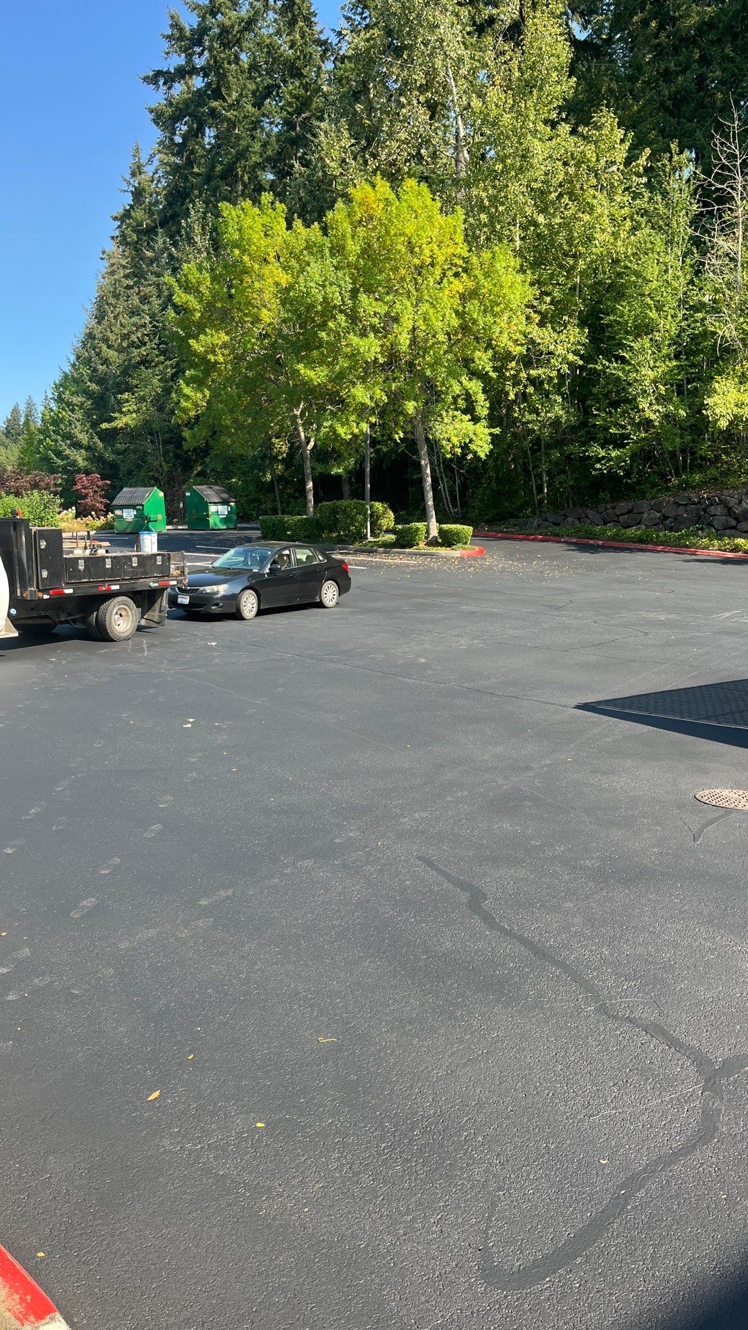 Kidder Matthews | Parking Lot Sealcoating & Striping with Concrete Curb & Patch Repairs  by Jireh Asphalt & Concrete Inc 
