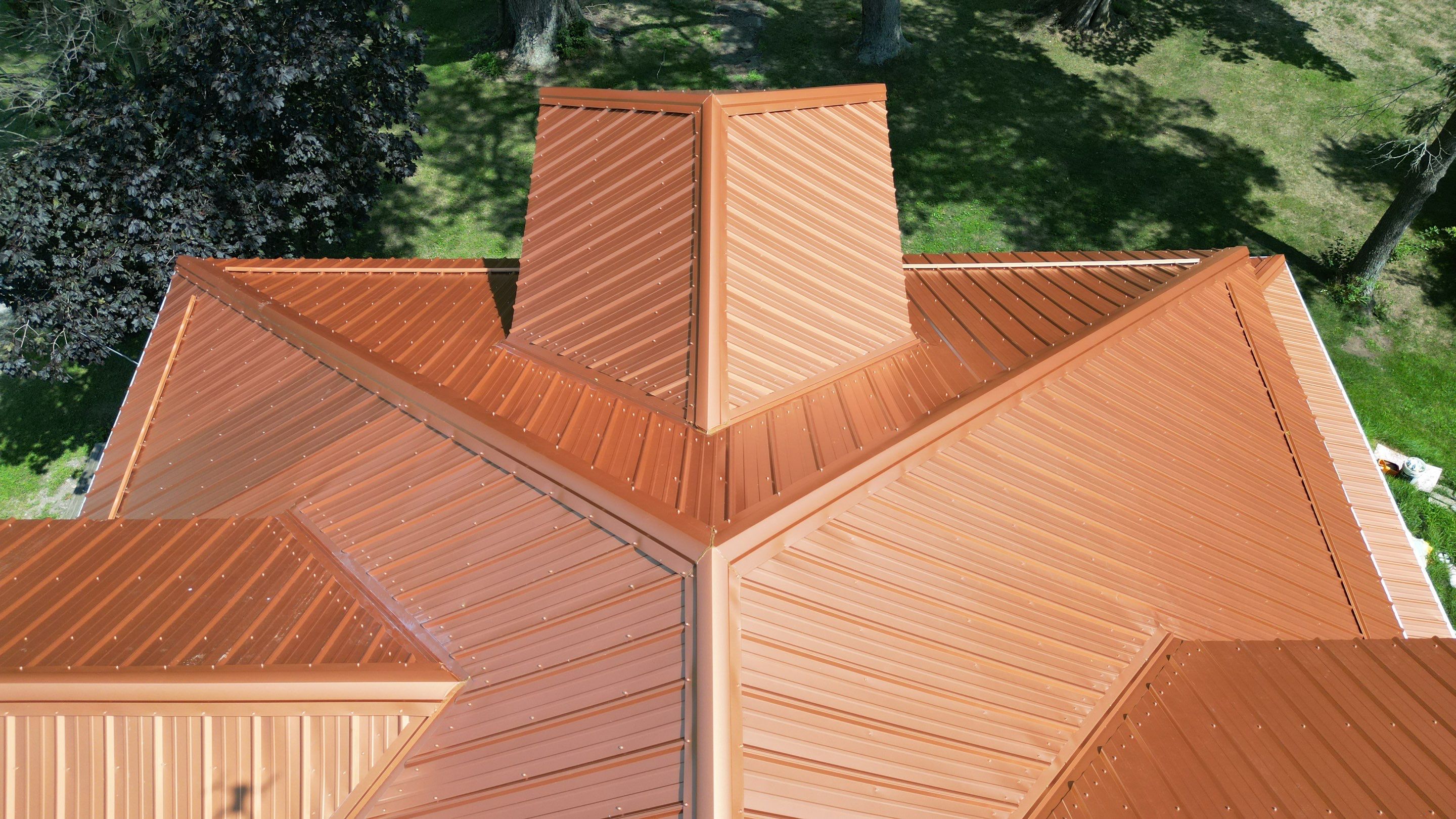 Residential Roofing Installation using Performance Panel Metal - Copper Metallic by RoofX 