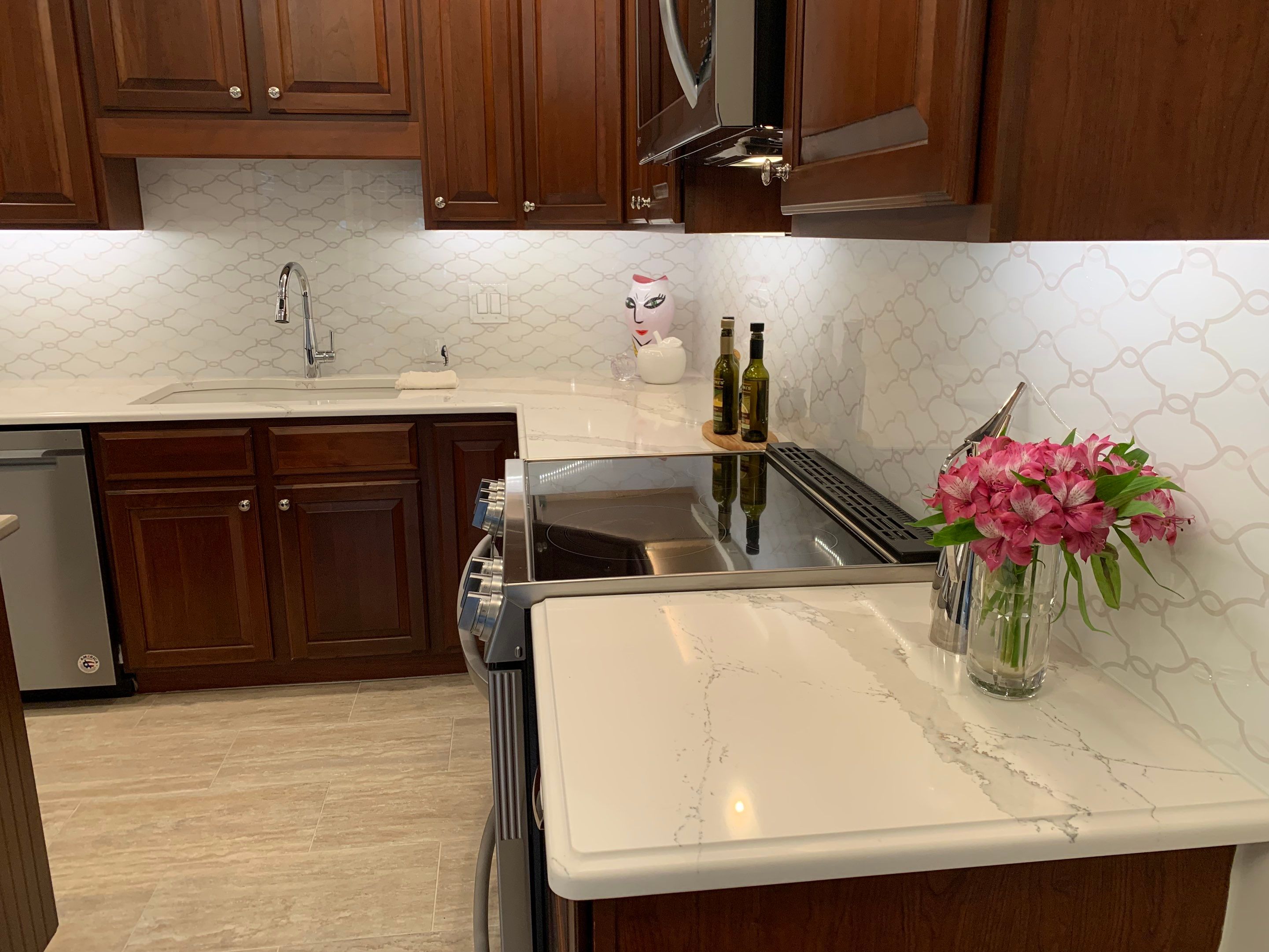 Kitchen Remodel using IMAGIO Solid Glass Backsplash Arabesque Drops by IMAGIO