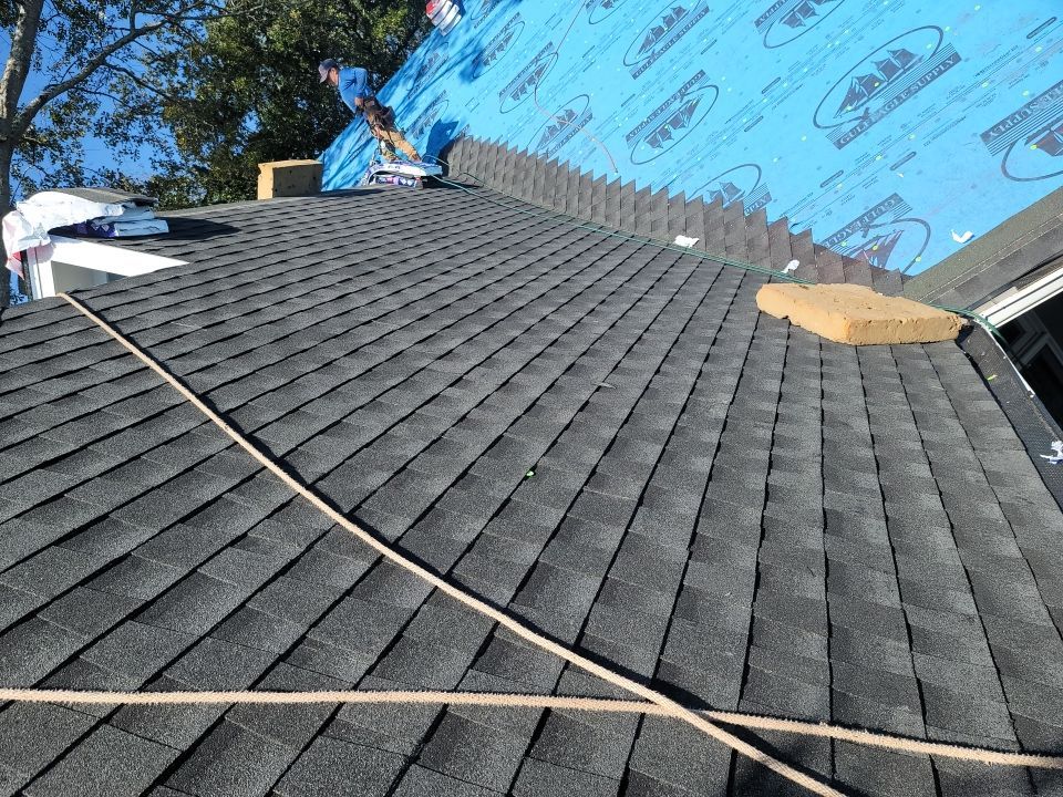 Residential Roofing Installation using Roof Replacement by American Roofing & Construction LLC