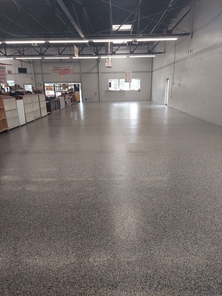 Interior Concrete Coating with Domino & Inlay by Copperhead Coatings