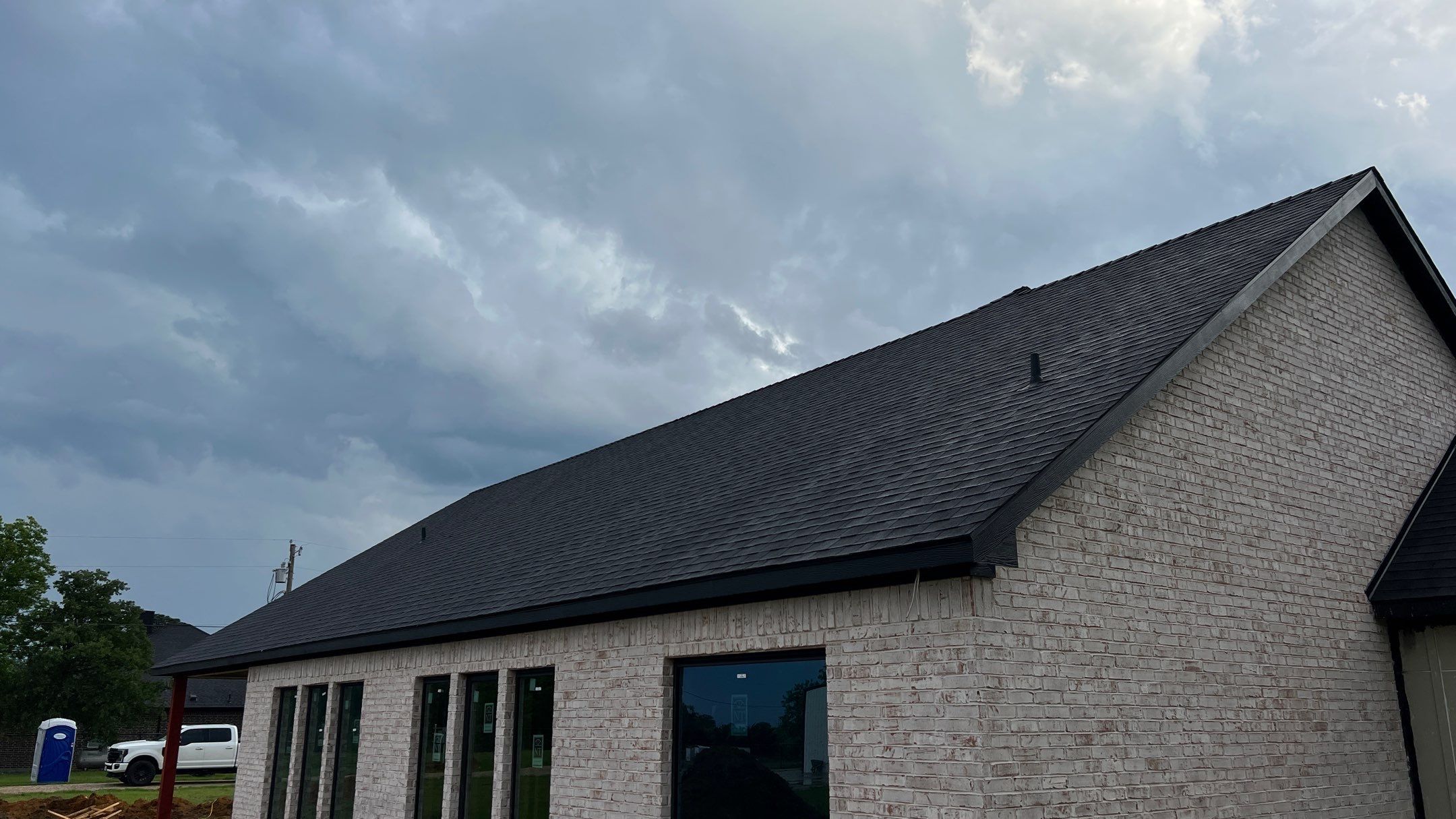 Residential Roofing Installation using ATLAS Pinnacle Pristine Shingles by Harvey Roofing & Construction