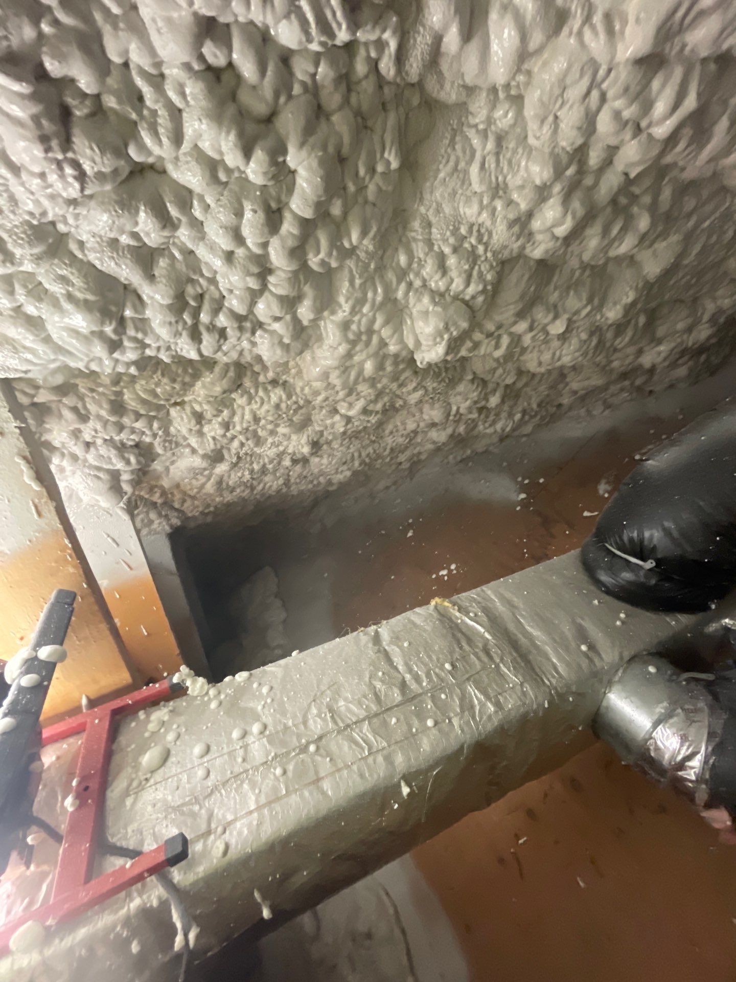 Attic Insulation using open cell spray foam by NYS Foam & Energy