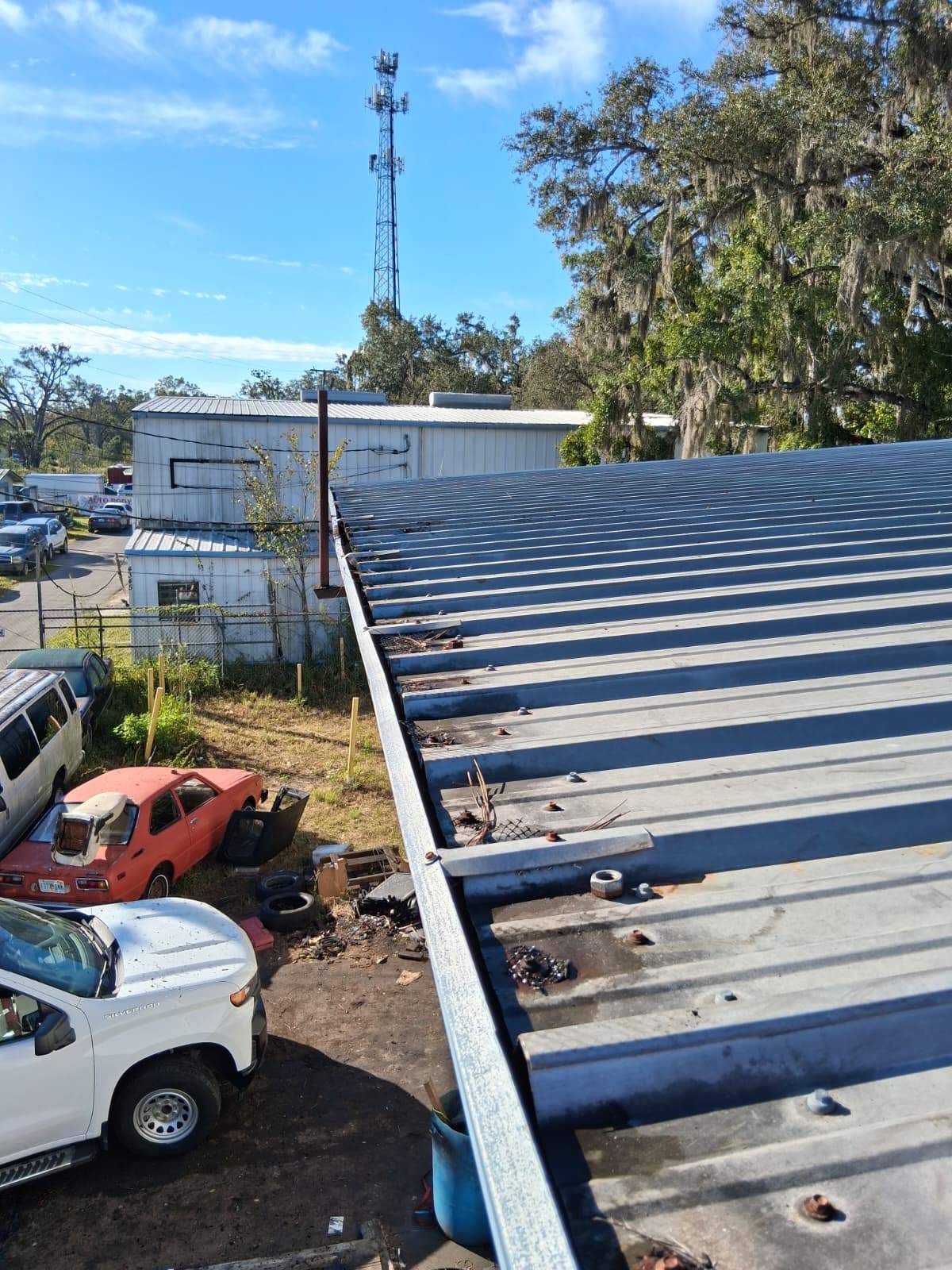 Clean Gutters and Seal Seams in Lakeland FL by Gutter Professors