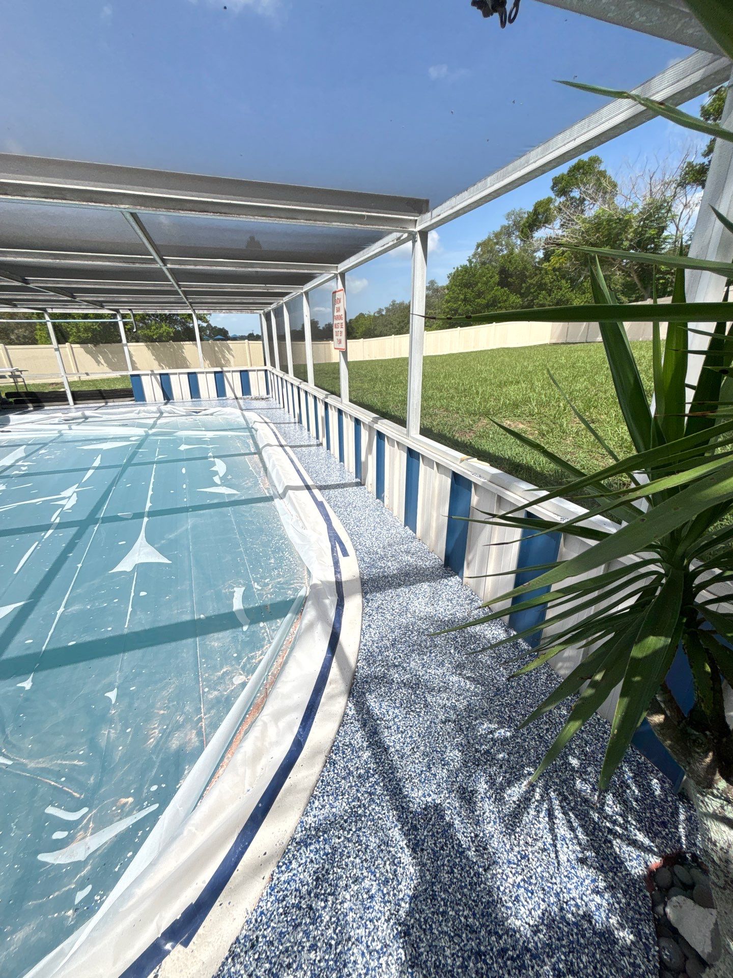 Lake Wales Pool Deck Concrete Coating with Orbit Flake by Performance Floors & Coating