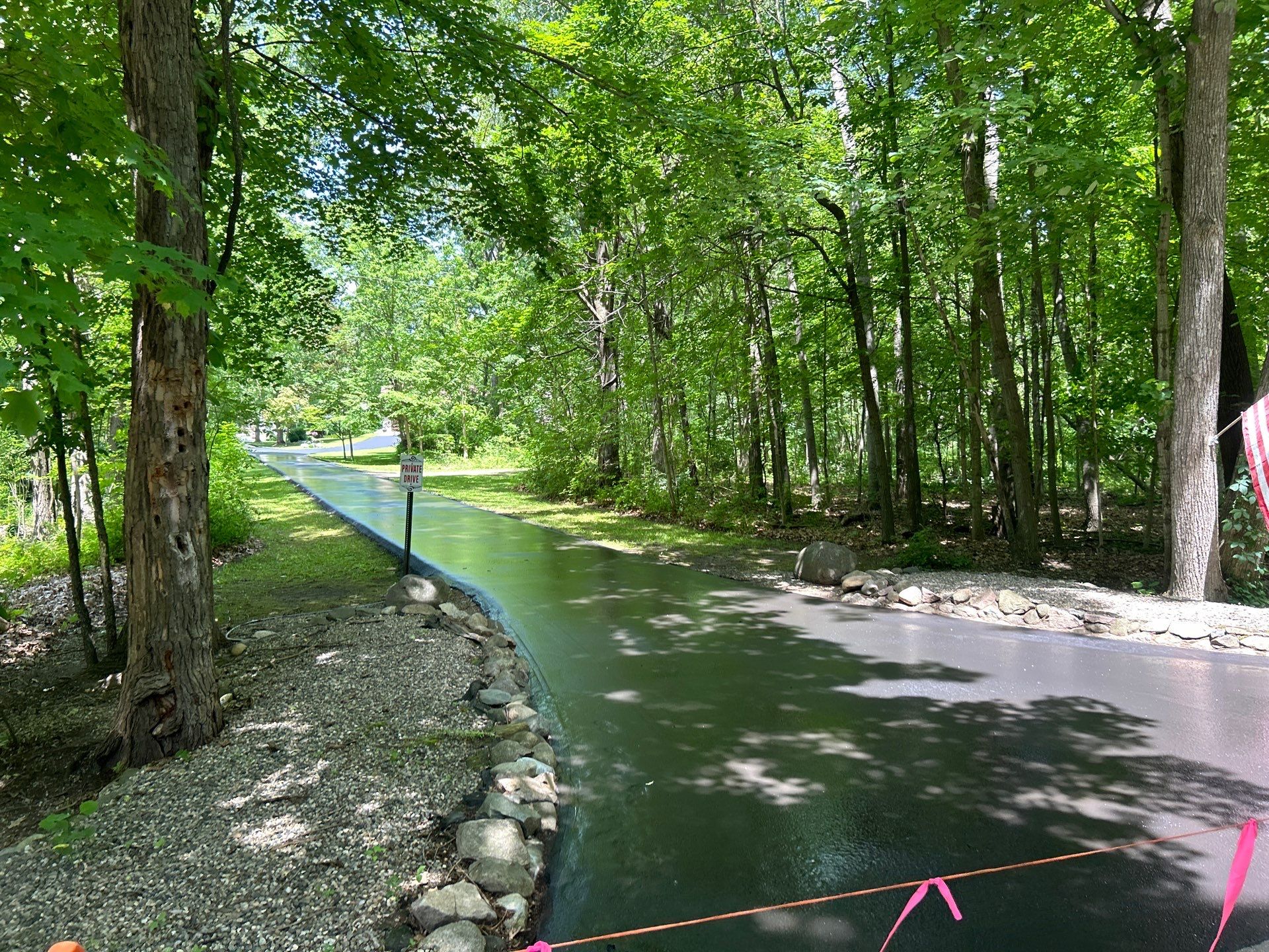 High end residential driveway by Quality Asphalt & Maintenance LLC