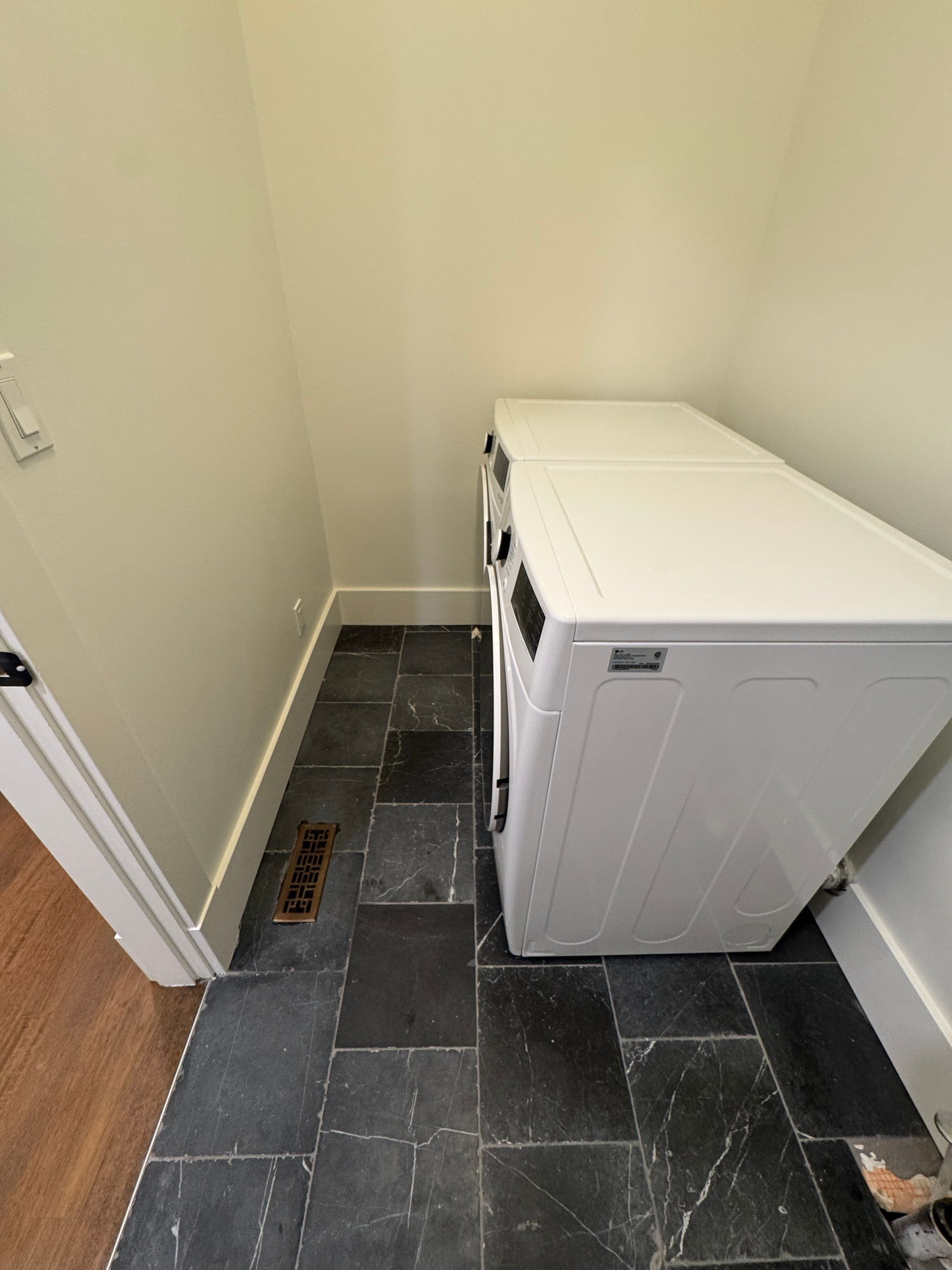 High-End Laundry Room Renovation and Restoration in Vancouver by YVR Construction Group