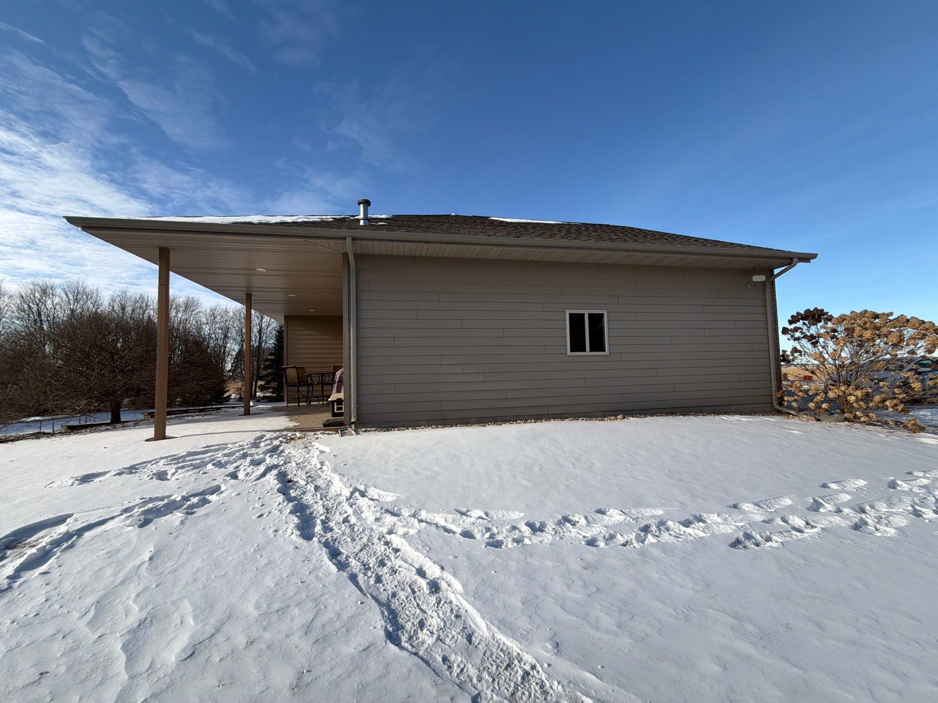 Full Exterior Siding Transformation and Trim Update in Garretson by Select Painting, Coatings & Garage Cabinets