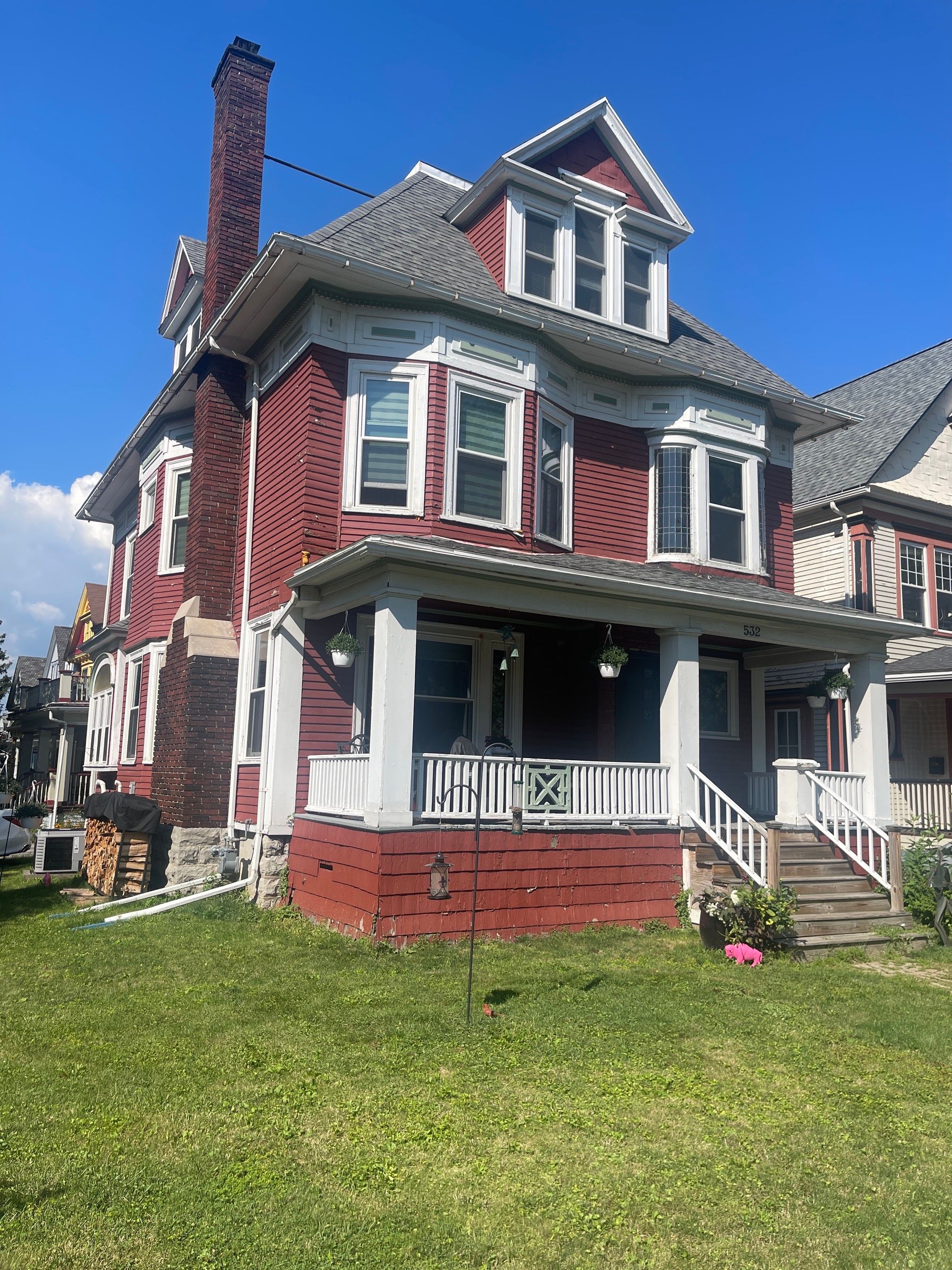 Exterior Renovations- Siding, Stamped Concrete, Porch, and Railings by Ivy Lea Construction
