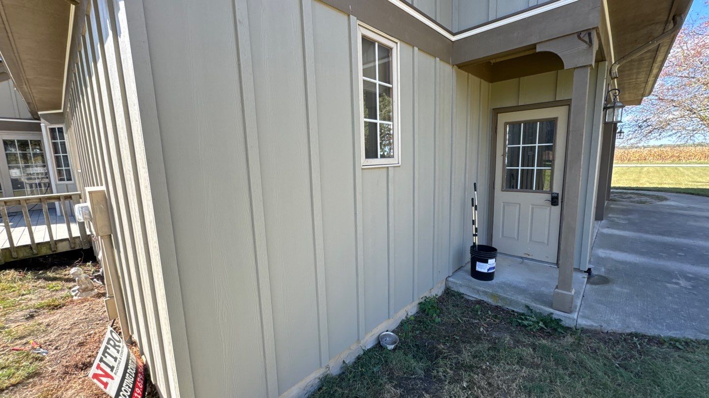 Siding Installation using Hardie Board and Batten Monterey Taupe by Nitro Roofing and Construction