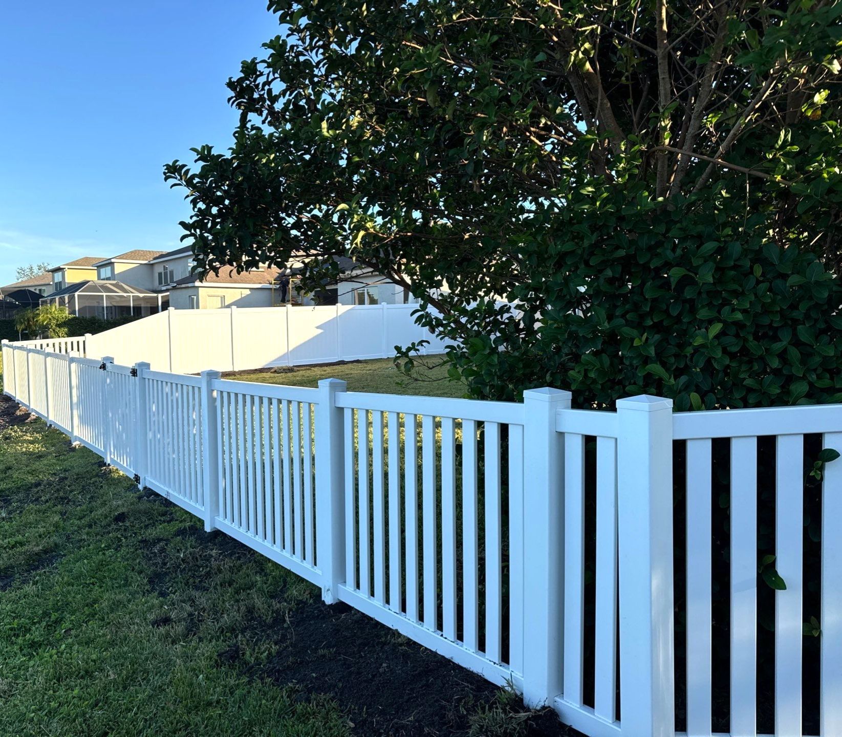 Vinyl Picket Fence Installation using 6Ft White Vinyl Privacy Fence with a 4Ft White Clearwater Picket Fence by Asap fence and gates, LLC