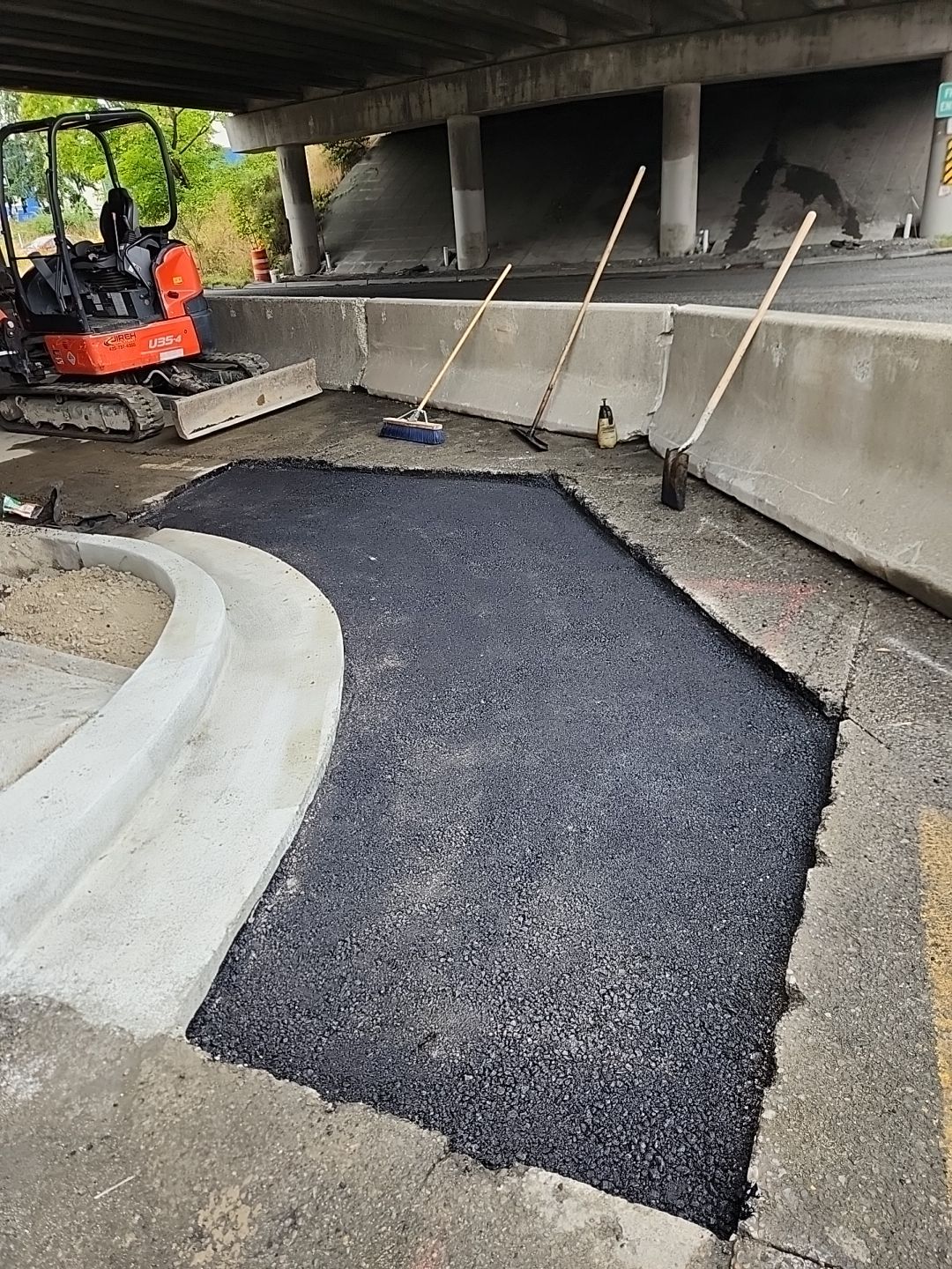 Kraemer North America | Airport Road Repair by Jireh Asphalt & Concrete Inc 