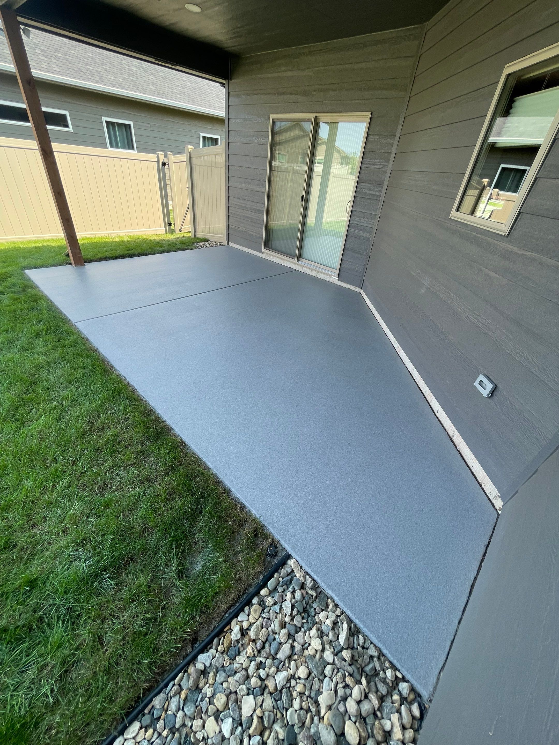 Sioux Falls Residential Concrete Patio and Walkway Coating by Select Painting, Coatings & Garage Cabinets