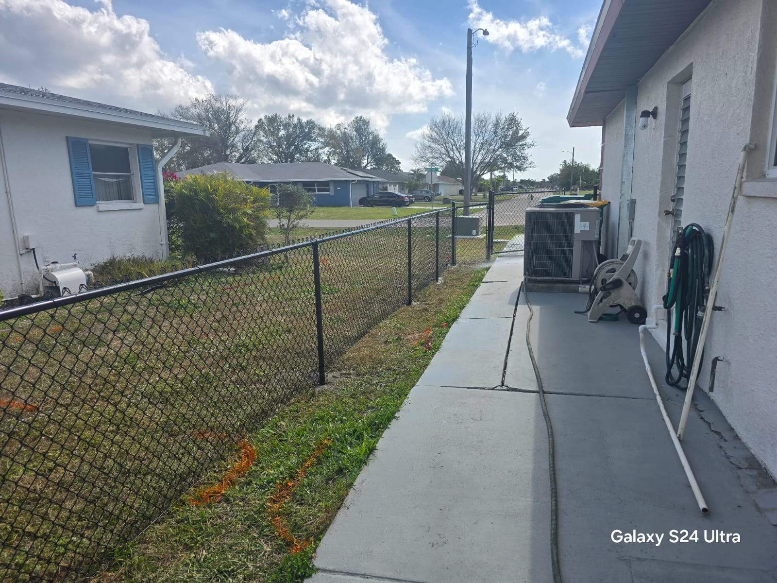 Black Chain Link Fence Installation for Port Charlotte Residence by True Fence LLC