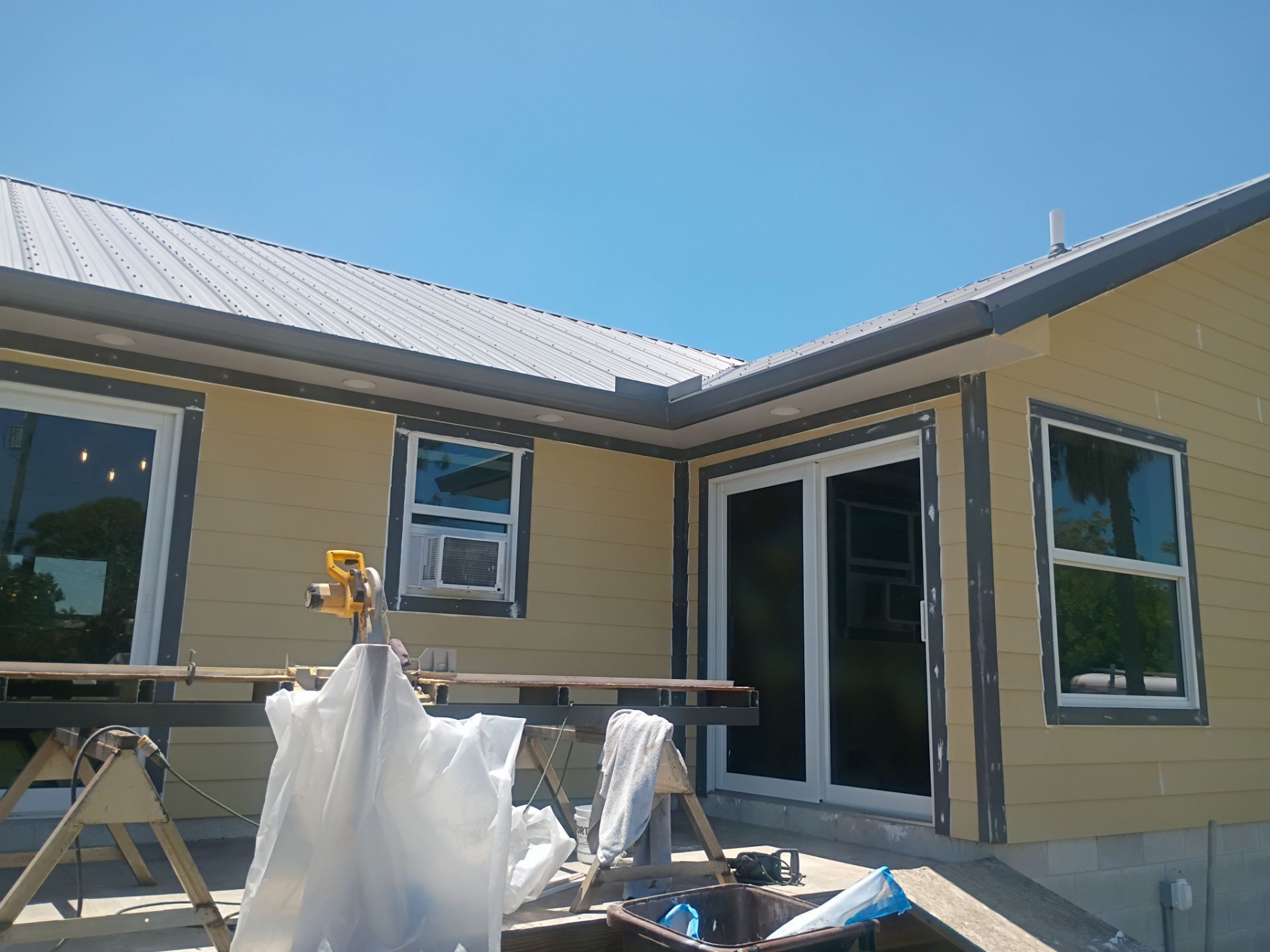 Musket Brown Seamless Gutters Installation in Saint James City, FL  by Gutter Professors