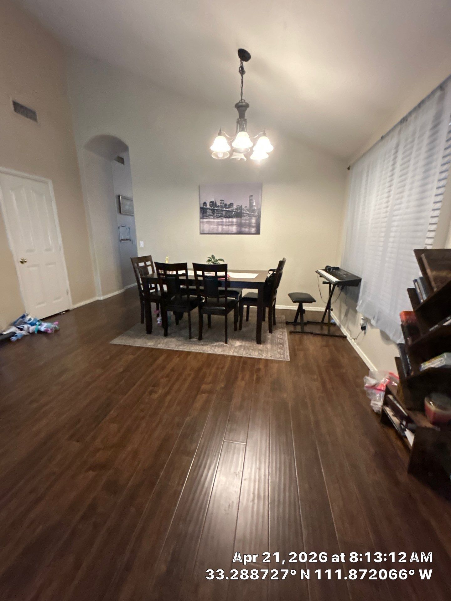 Dark Wood Laminate Floor Installation and Dining Room Renovation in Chandler by CompanyCam Sales Demo