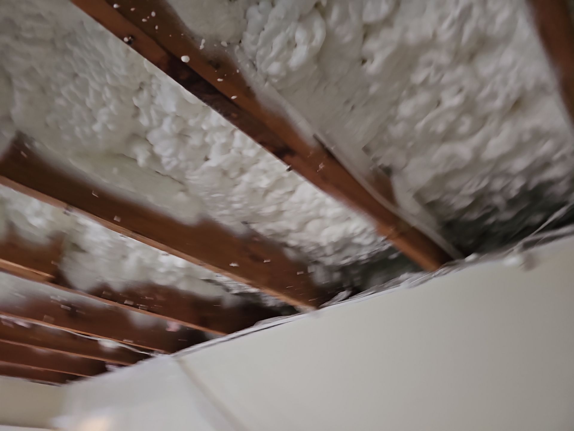 Attic Insulation using open cell spray foam by NYS Foam & Energy