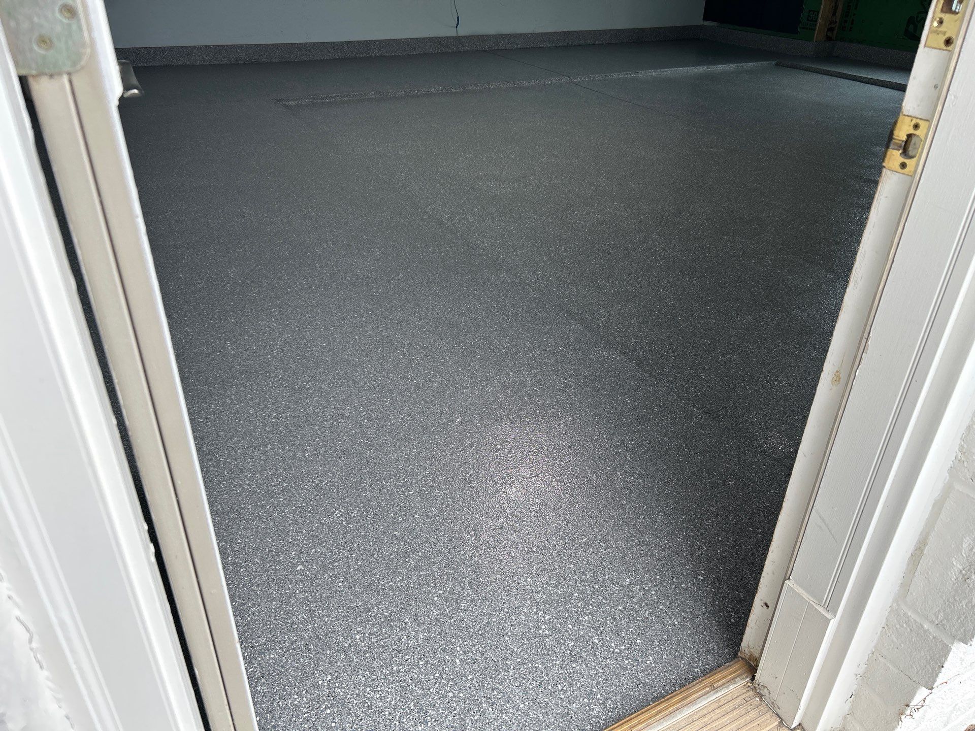 Turquoise Floor Coating in Elkhart! by Innovative Spaces / Innovative Concrete Coatings