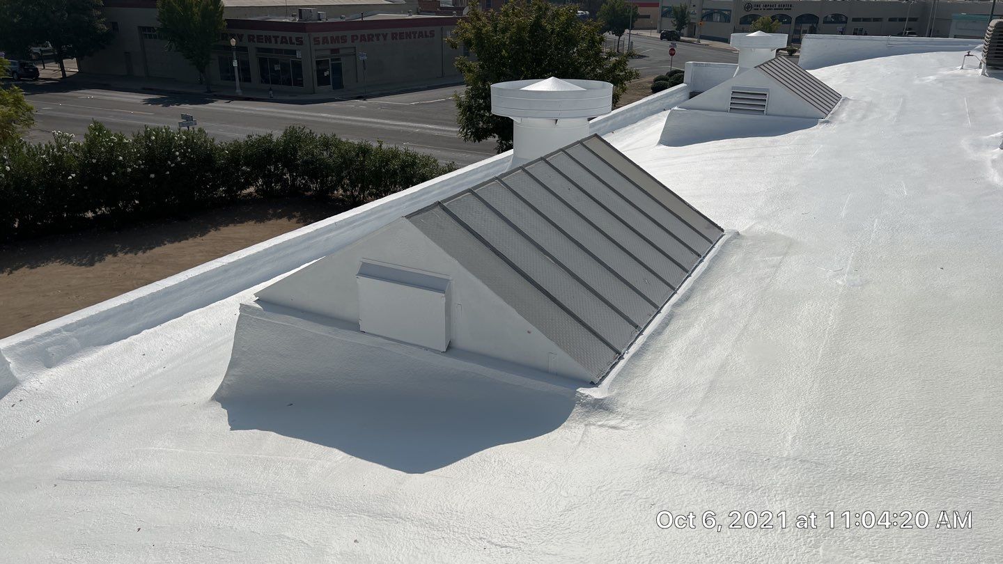 Polyurethane foam roof refurbish and recoating by Straight Edge Roofing Inc