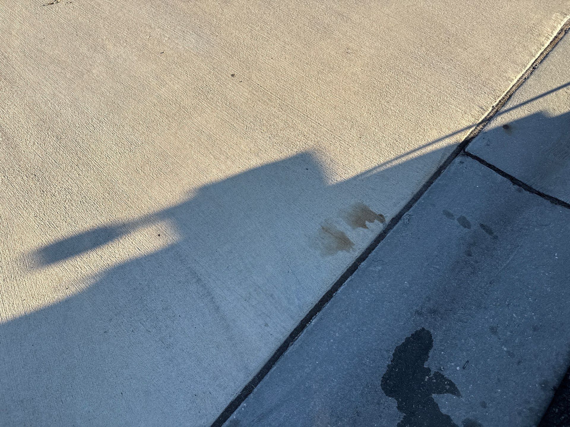 Rust Stain Removal from Concrete Driveway and Pavers in Park East at Azario | Lakewood Ranch, FL by Sunshine AquaWash