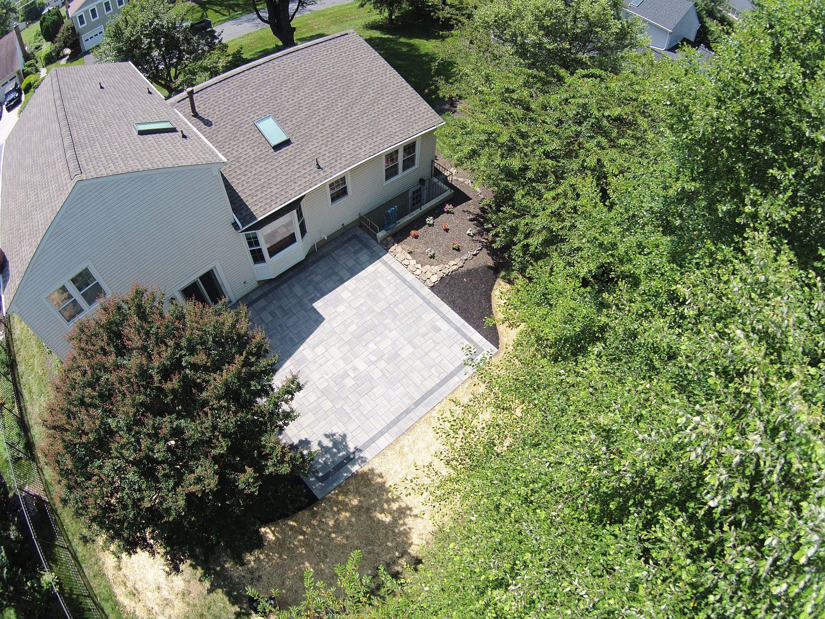 Backyard Transformation using Techo-Bloc Pavers by The Smet Companies, LLC