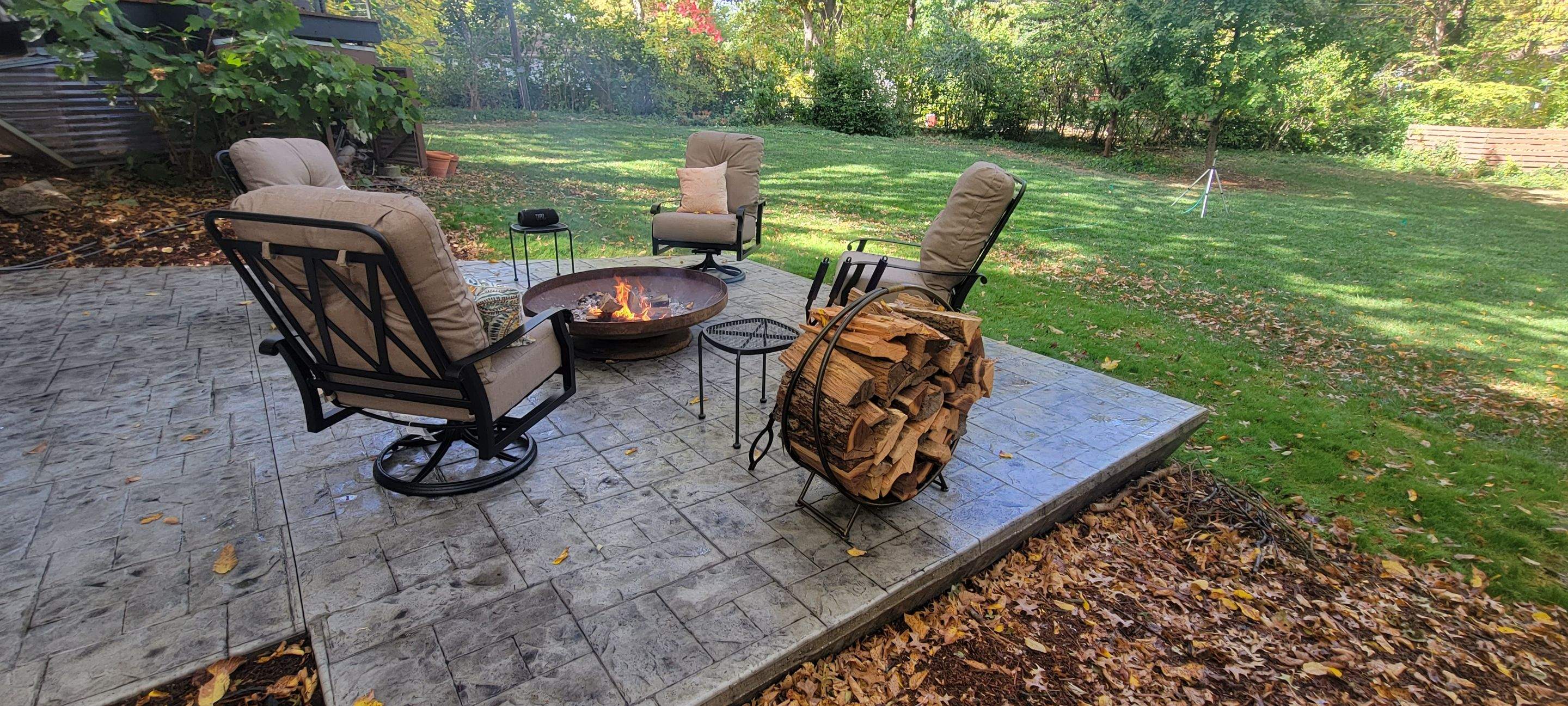 Back Yard Cantilivered Patio by LAND ESCAPES LLC