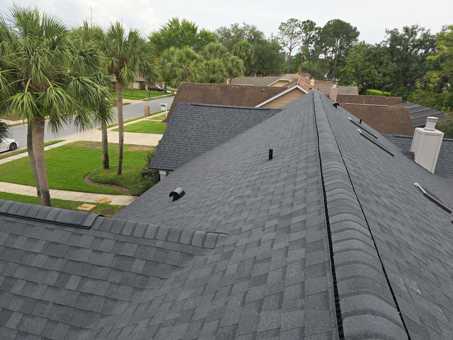 Asphalt Architectural Shingle Roof Replacement and Solar Integration in Longwood by Fortified Roofing Solutions Corp.