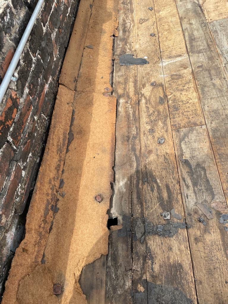 Commercial Roofing Installation using Conklin BenchPly system with PUMA top coat (imbedded fabric system) by Straight Edge Roofing Inc