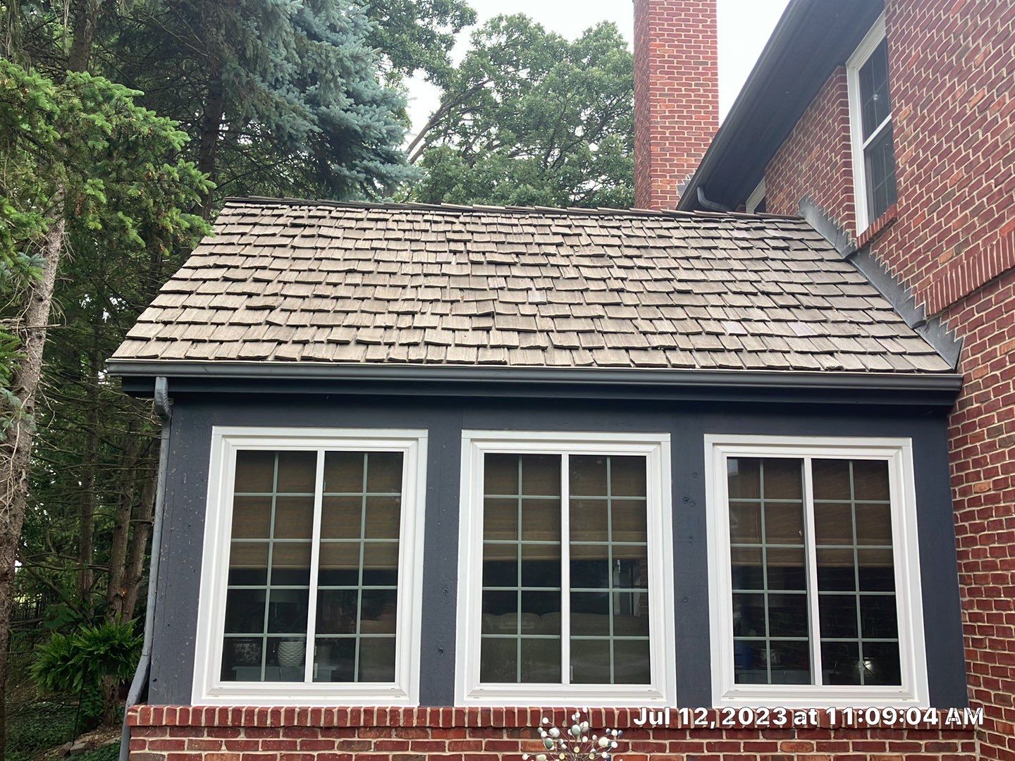 Asphalt Roof Replacement by Custom Installations