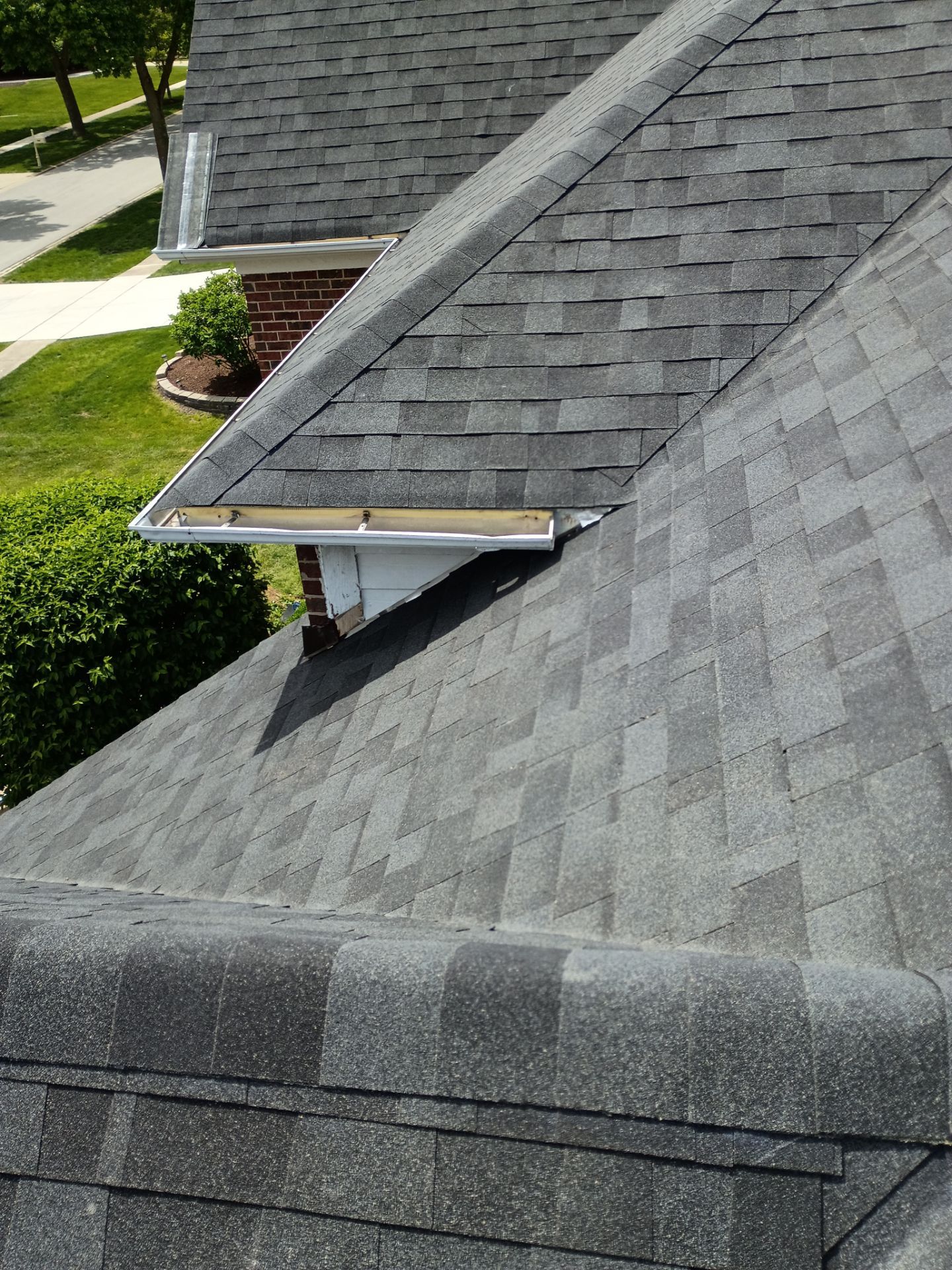Asphalt Shingle Roof Replacement and Skylight Installation in Darien by Pro Home Services Inc