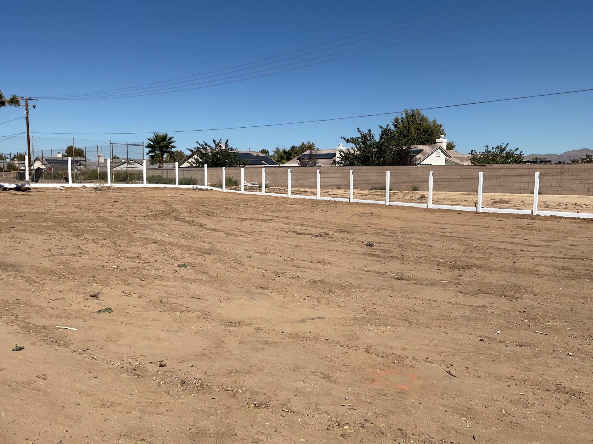 White picket fence  by Fence Guys Inc. 
