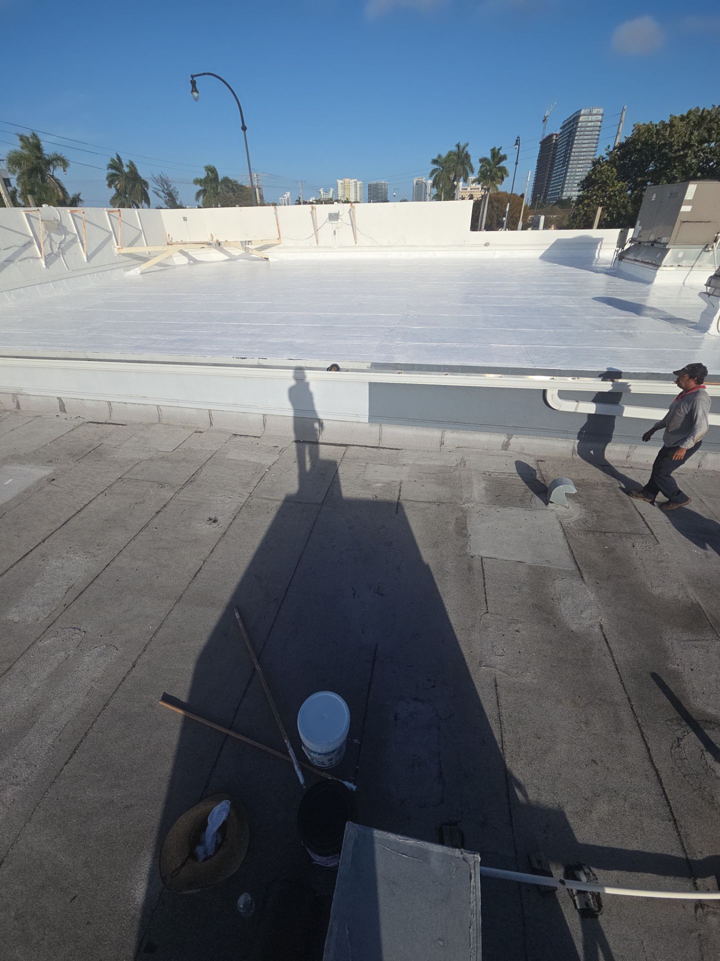 Commercial Flat Roof Restoration Using Silicone Coating in Hallandale Beach by Aastro Roofing