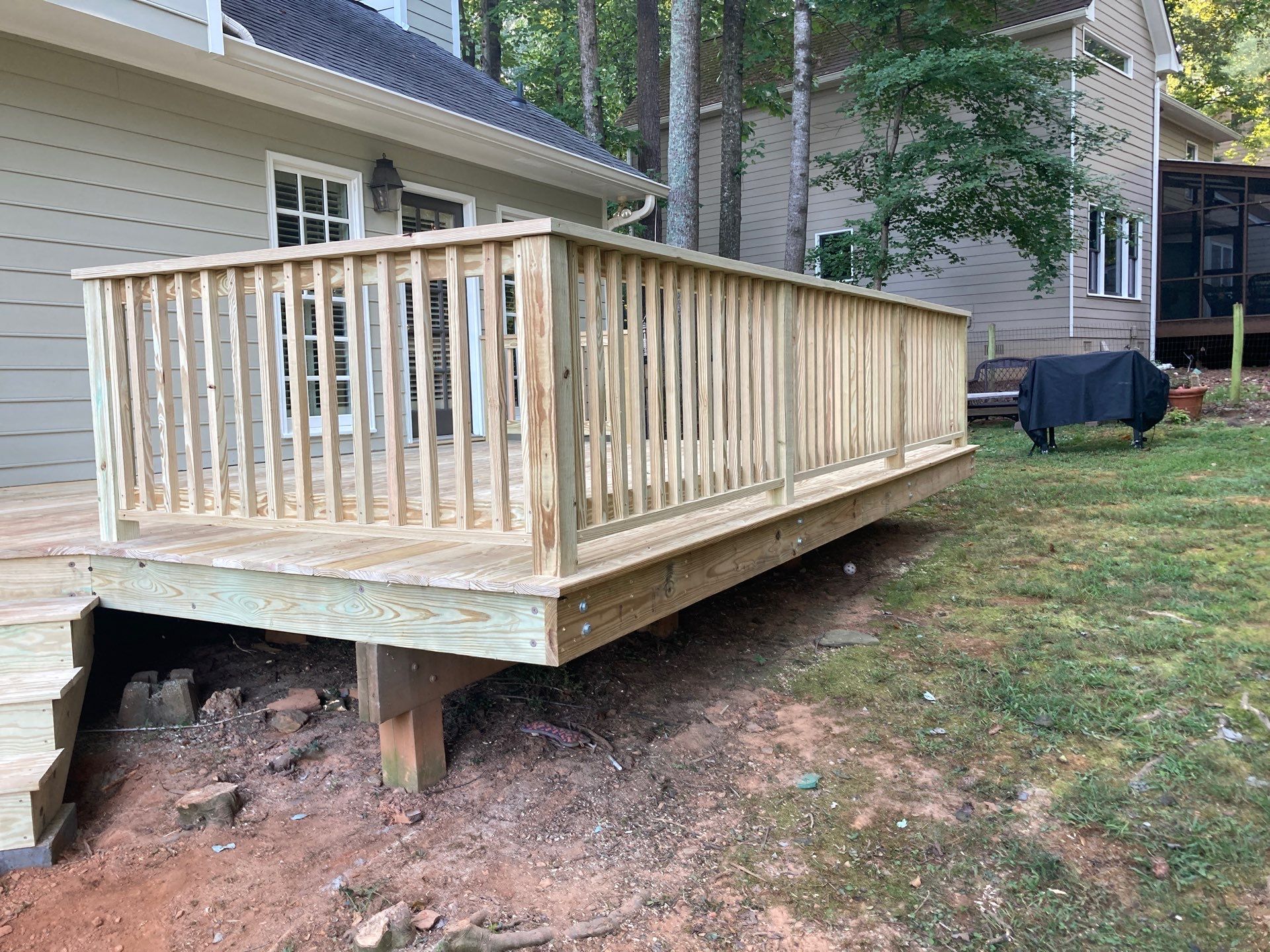 Pressure Treated Wood Resurface by Nelson Exteriors 