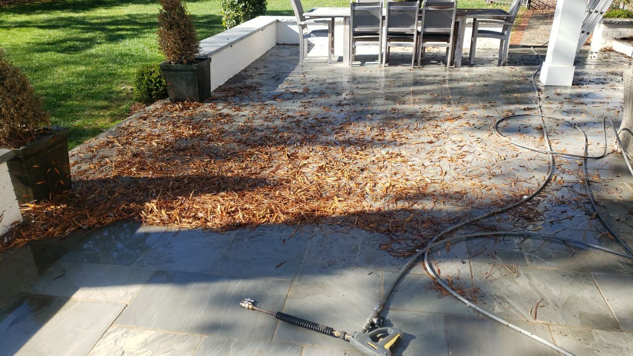 Sara Gutter cleanout using water by G&H Home Tech Pros LLC