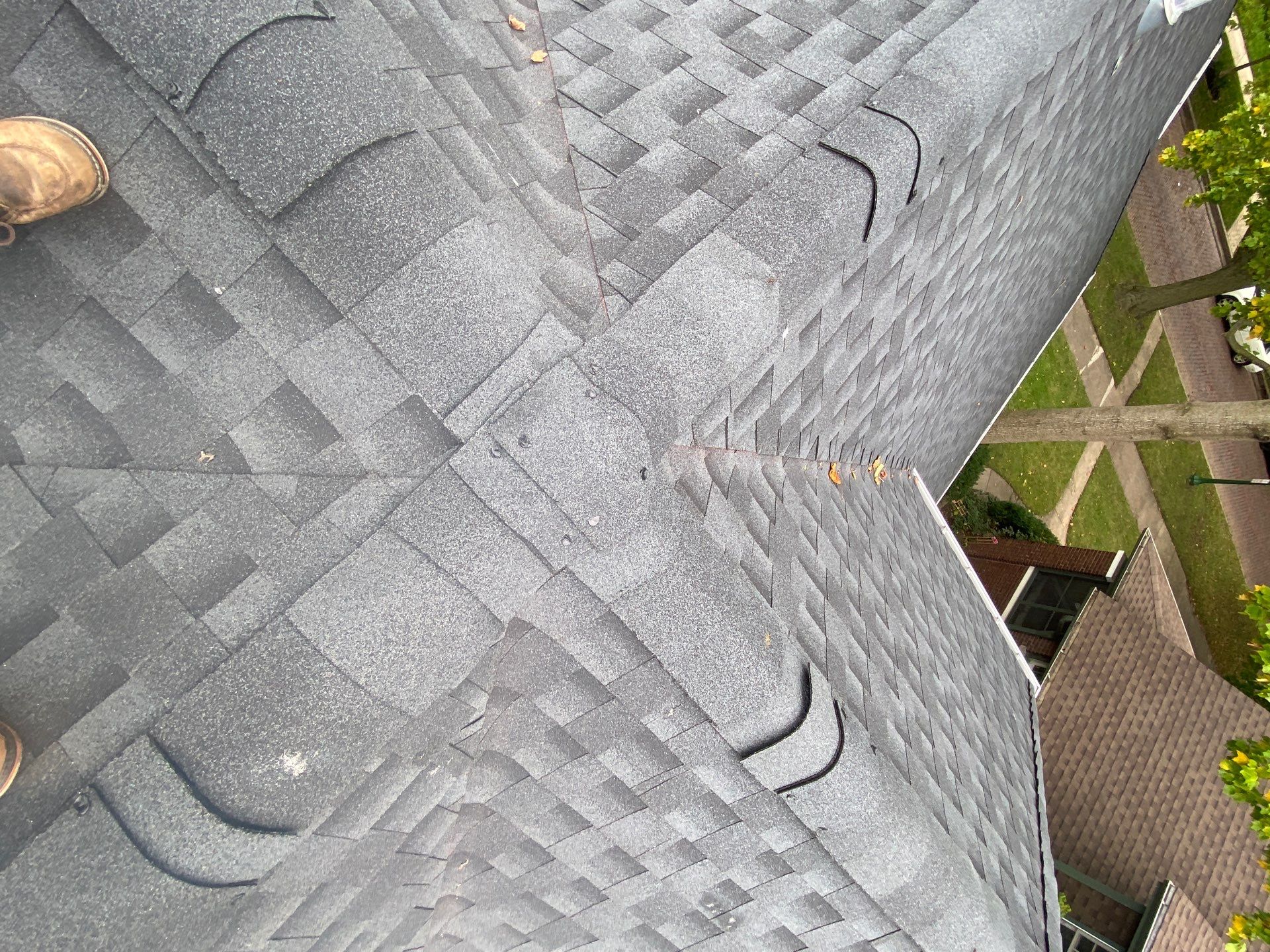 Asphalt Roof, Vinyl Siding, and Aluminum Gutter Replacement by Custom Installations