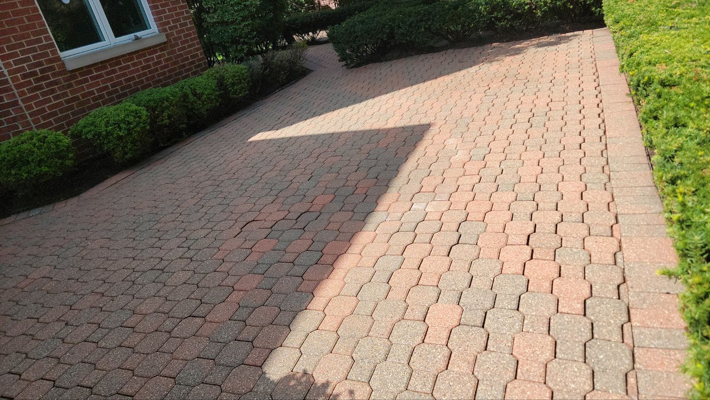 Brick paver repair, clean and seal by Northern Power Washing LLC.