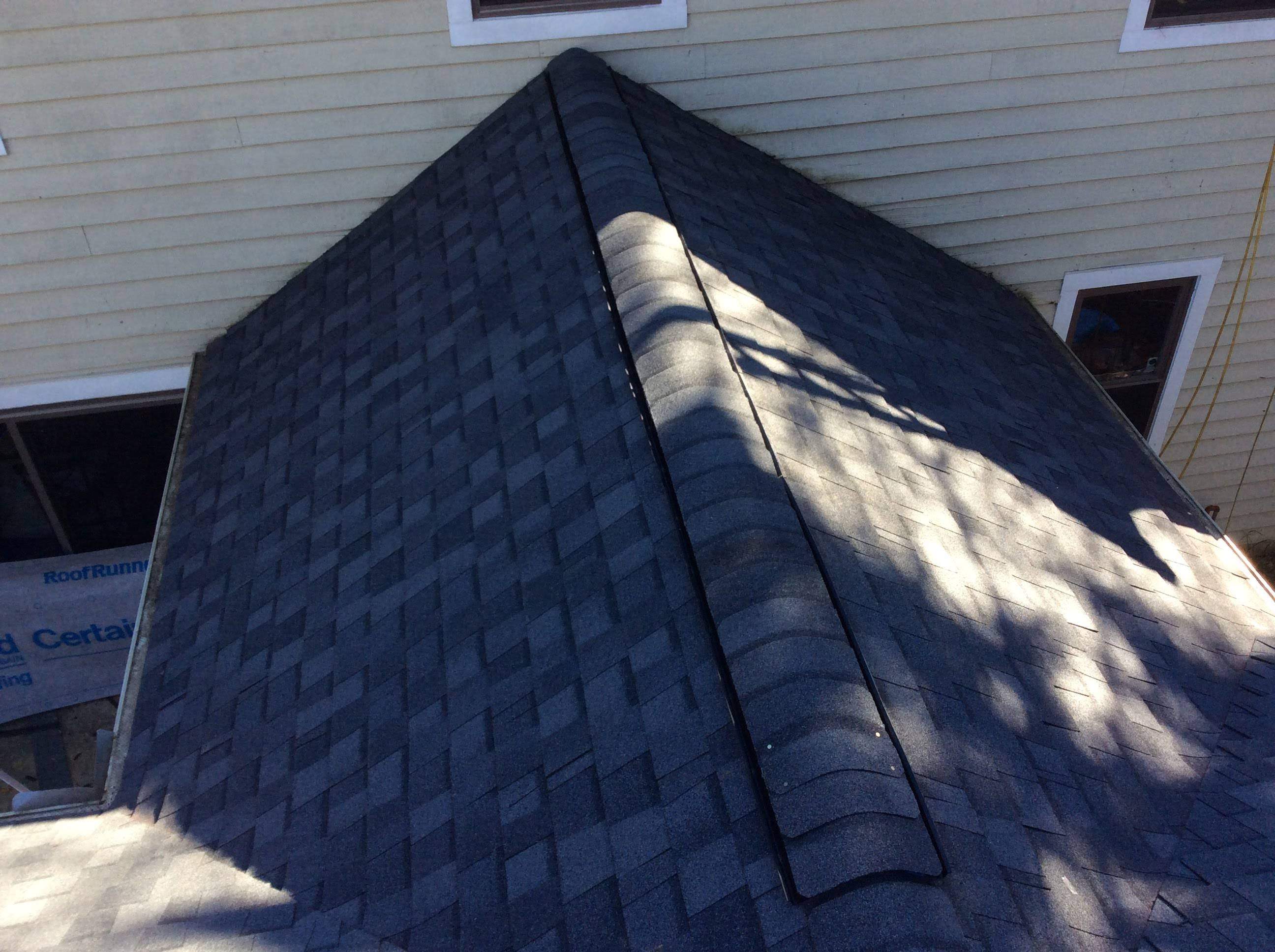 Residential Roofing Installation using Pewterwood Shingles  by Alpha Design Services