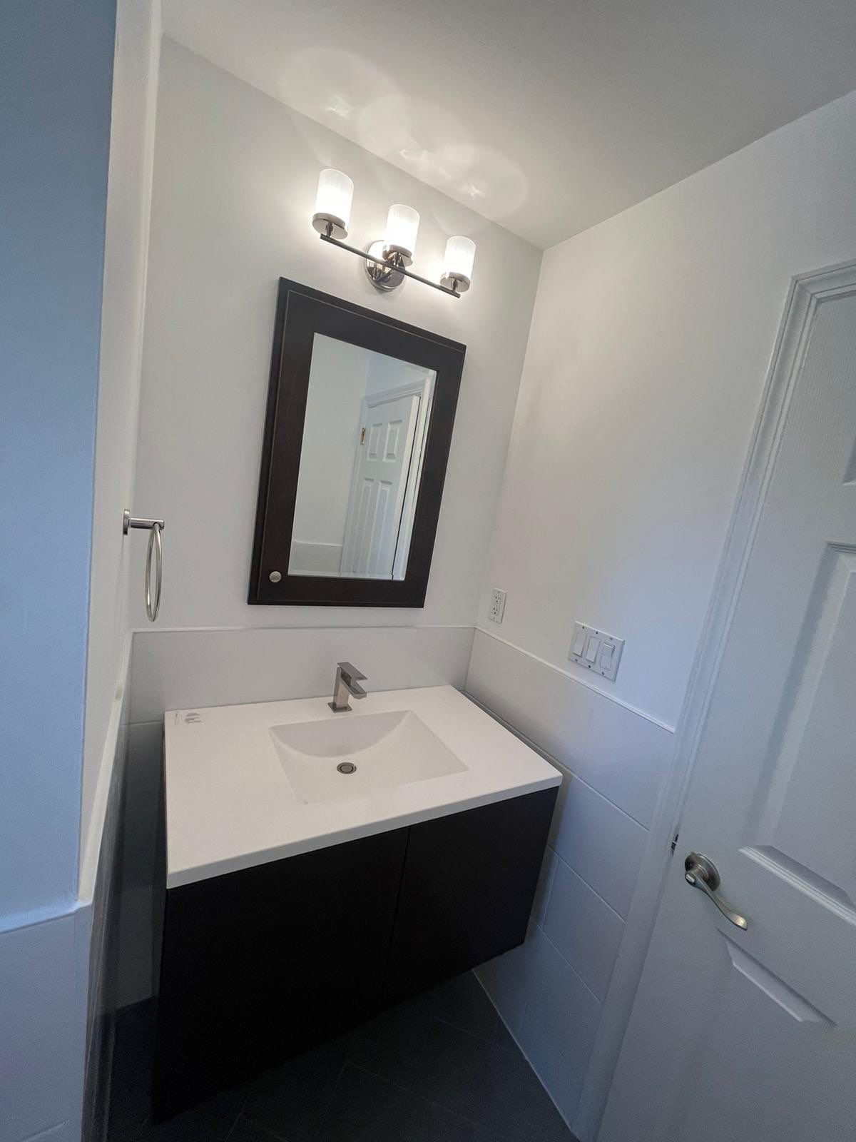 Bathroom Remodel using Tile by Home Concepts Construction