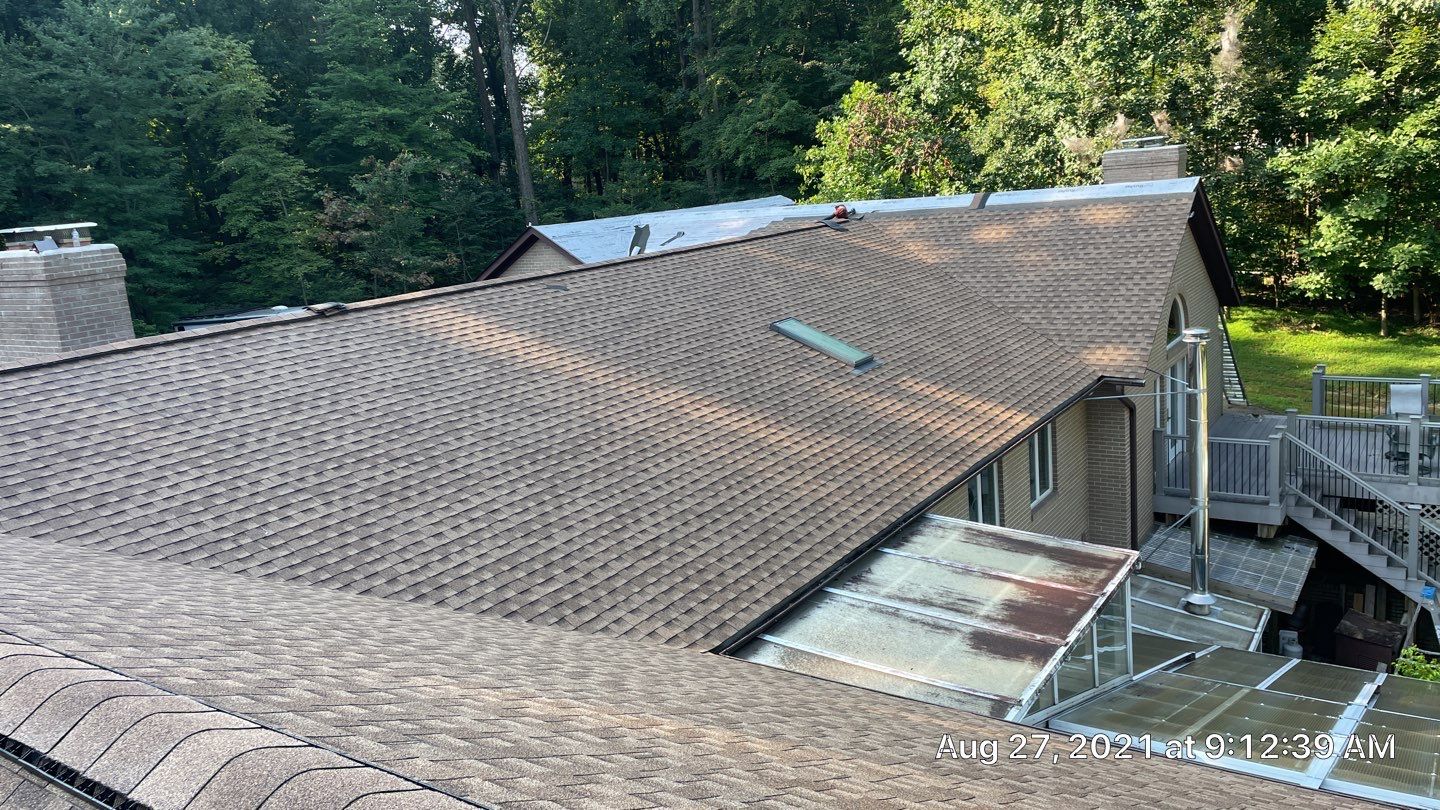 Roof Replacement using GAF Timberline HDZ by American Home Contractors